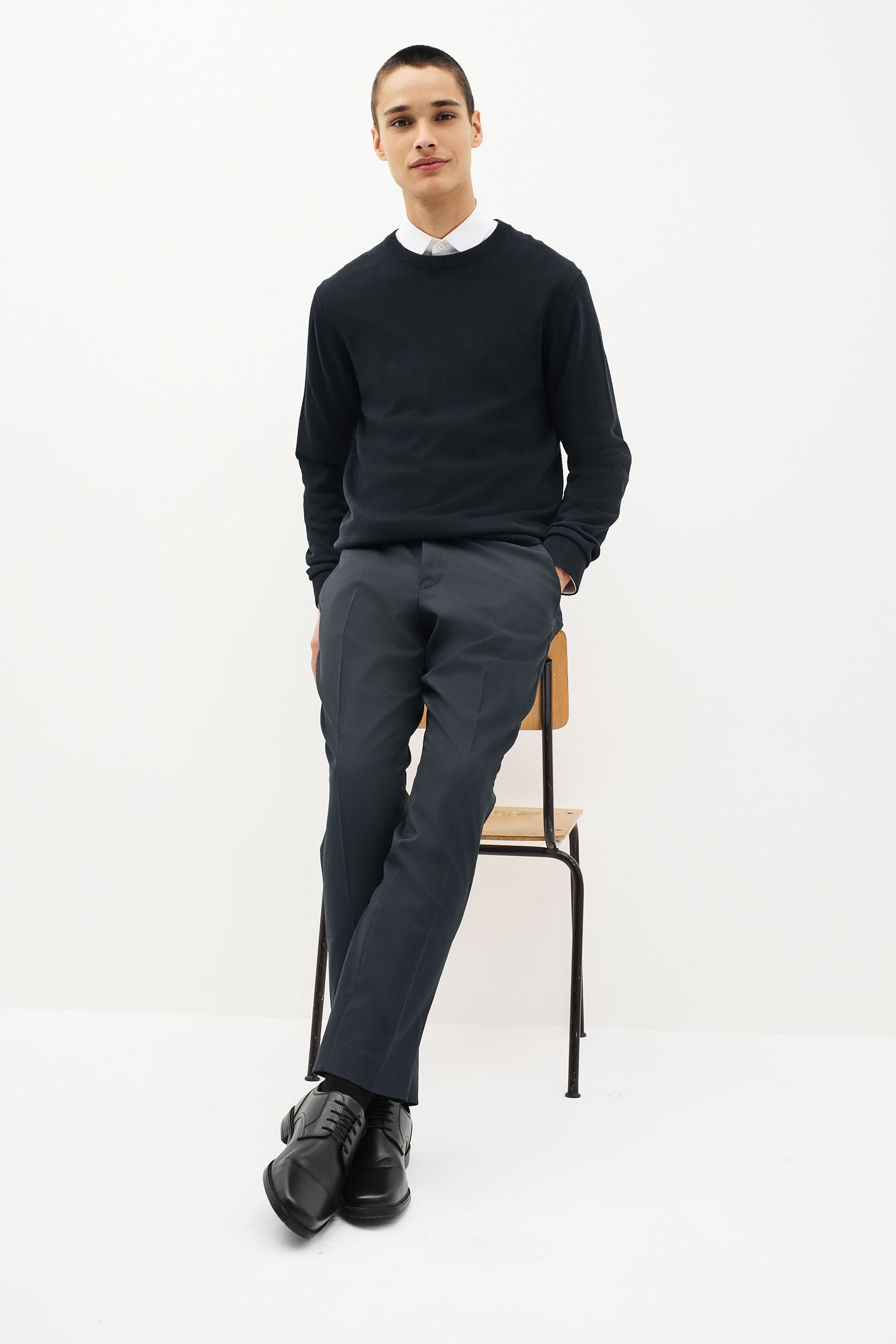 Black jumper blue trousers clearance