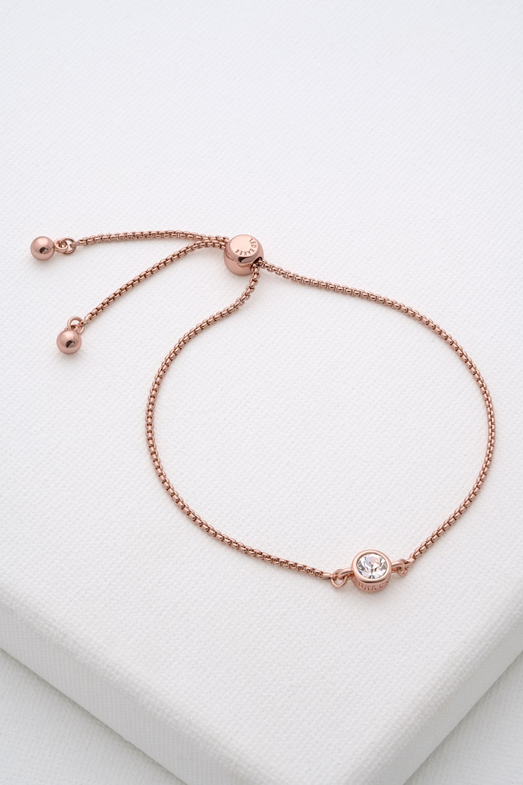 Buy Ted Baker Rose Gold Tone SARSAA Crystal Drawstring Adjustable Bracelet from Next Luxembourg