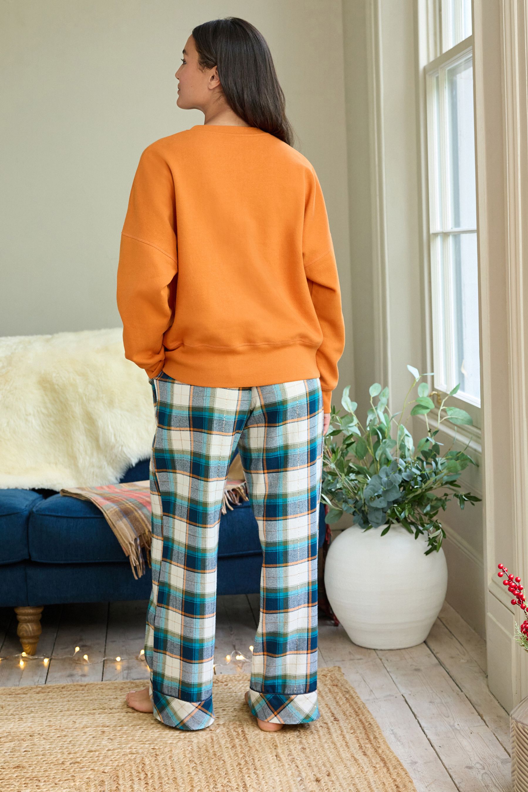 Buy Orange Pumpkin Sweatshirt and Flannel Bottom Pyjamas from Next Lithuania