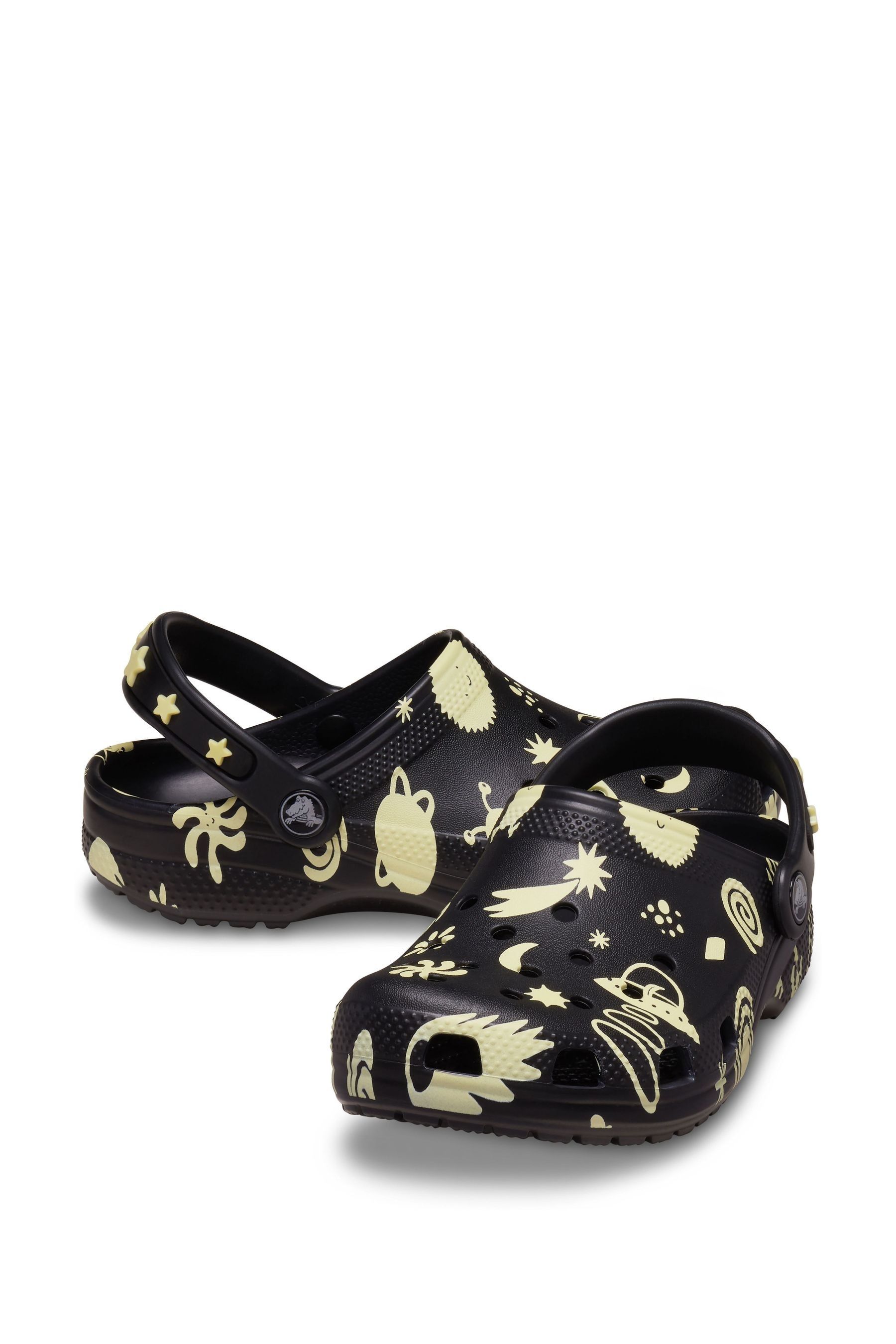 Buy Crocs Space Glow Kids Classic Glow Space Clogs from Next Germany