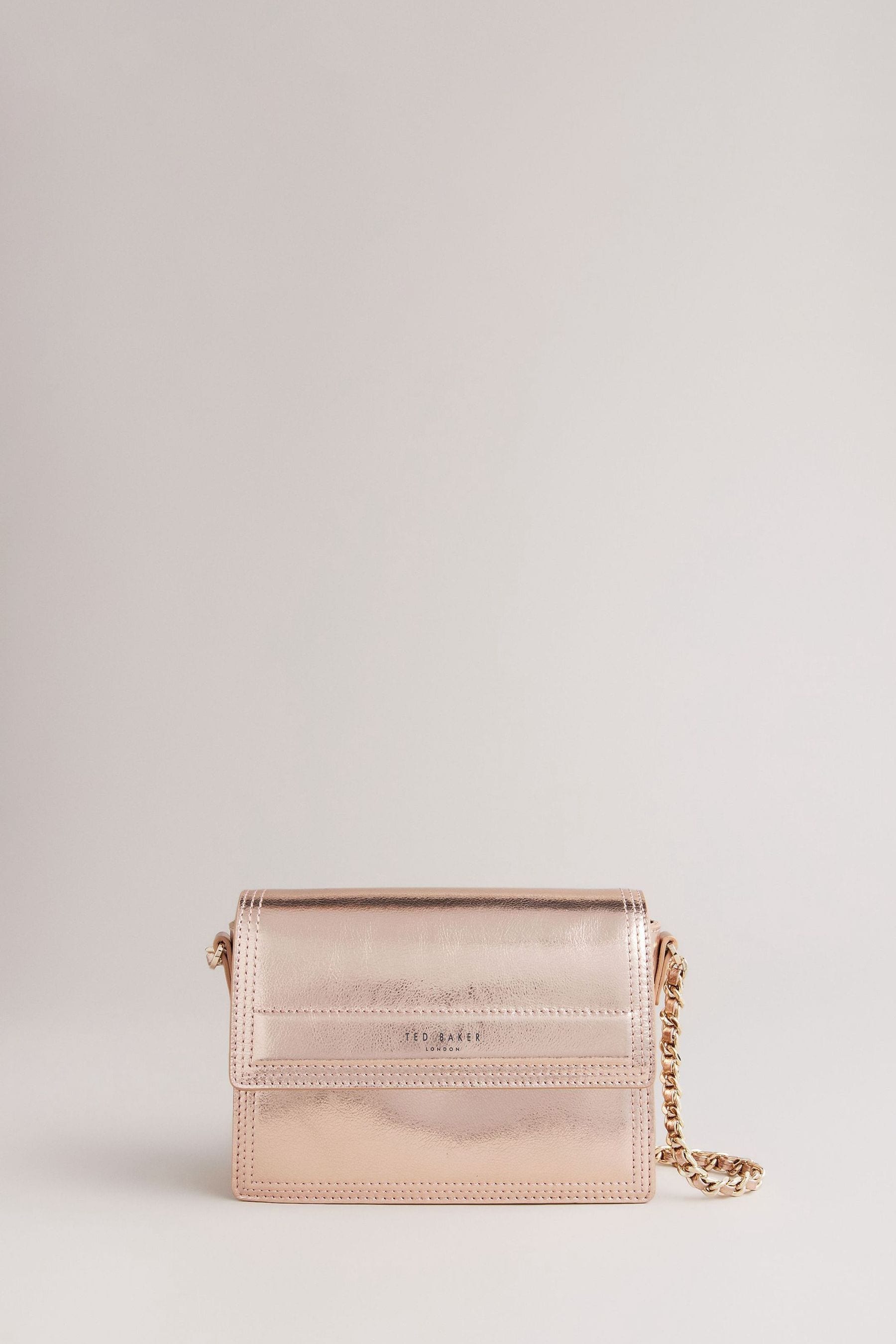 Rose gold metallic crossbody bag discount