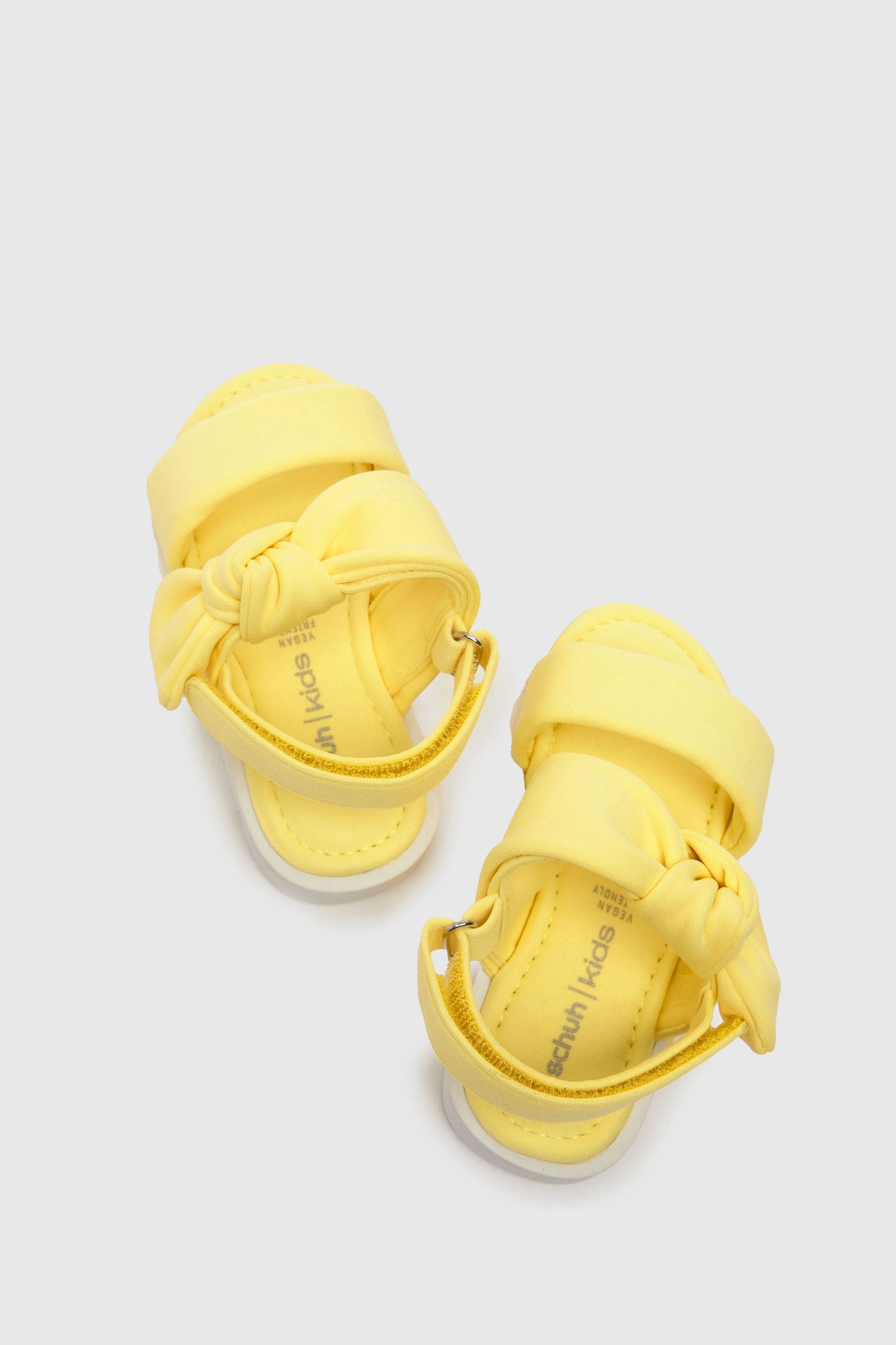 Yellow bow sandals top