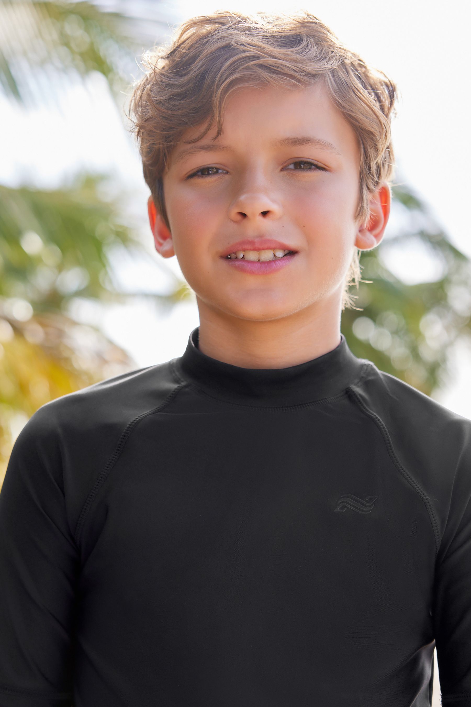 Buy Black Short Sleeve Sunsafe Rash Vest (1.5-16yrs) from the Next UK ...