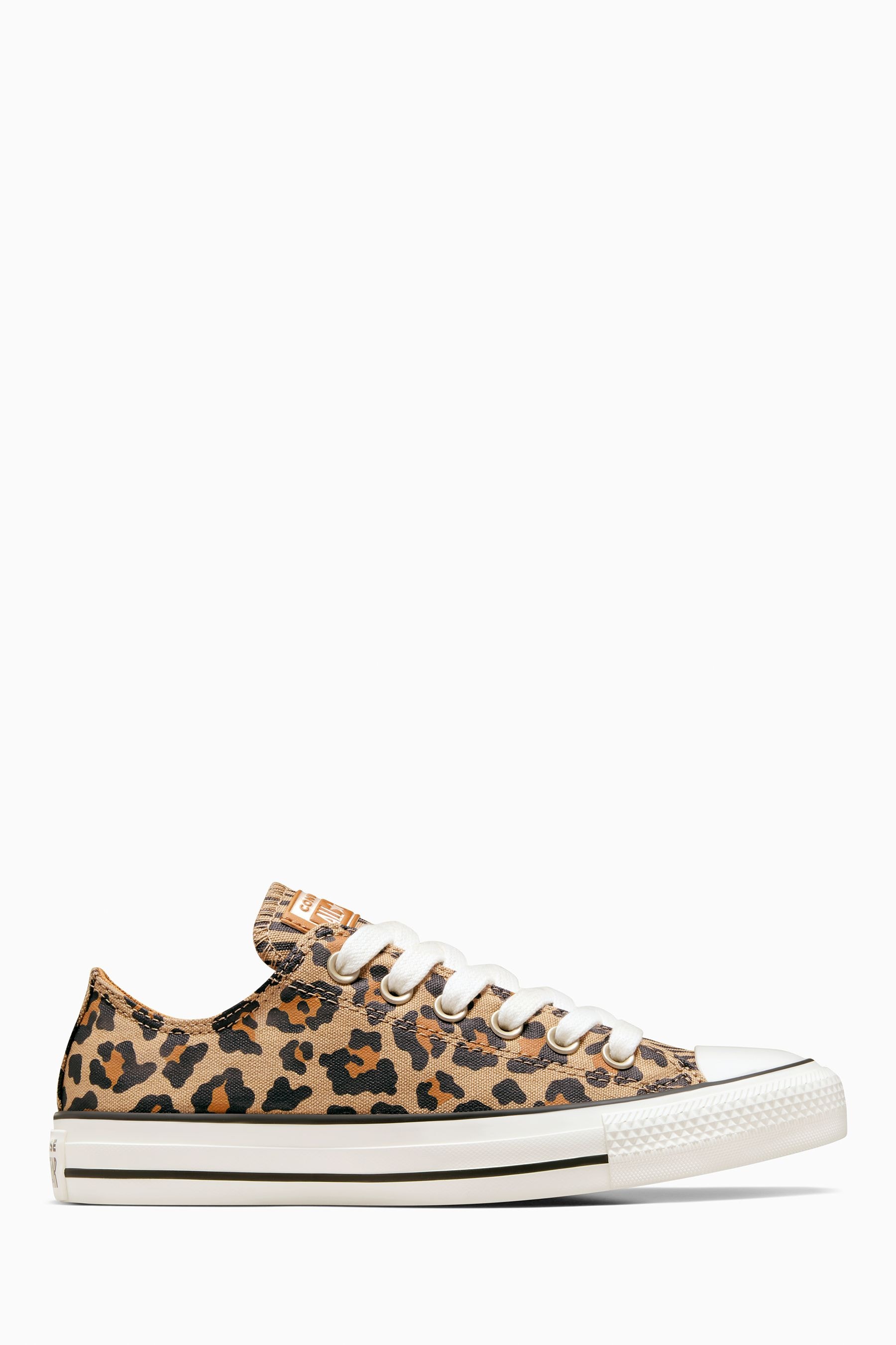 Animal print chuck taylors top