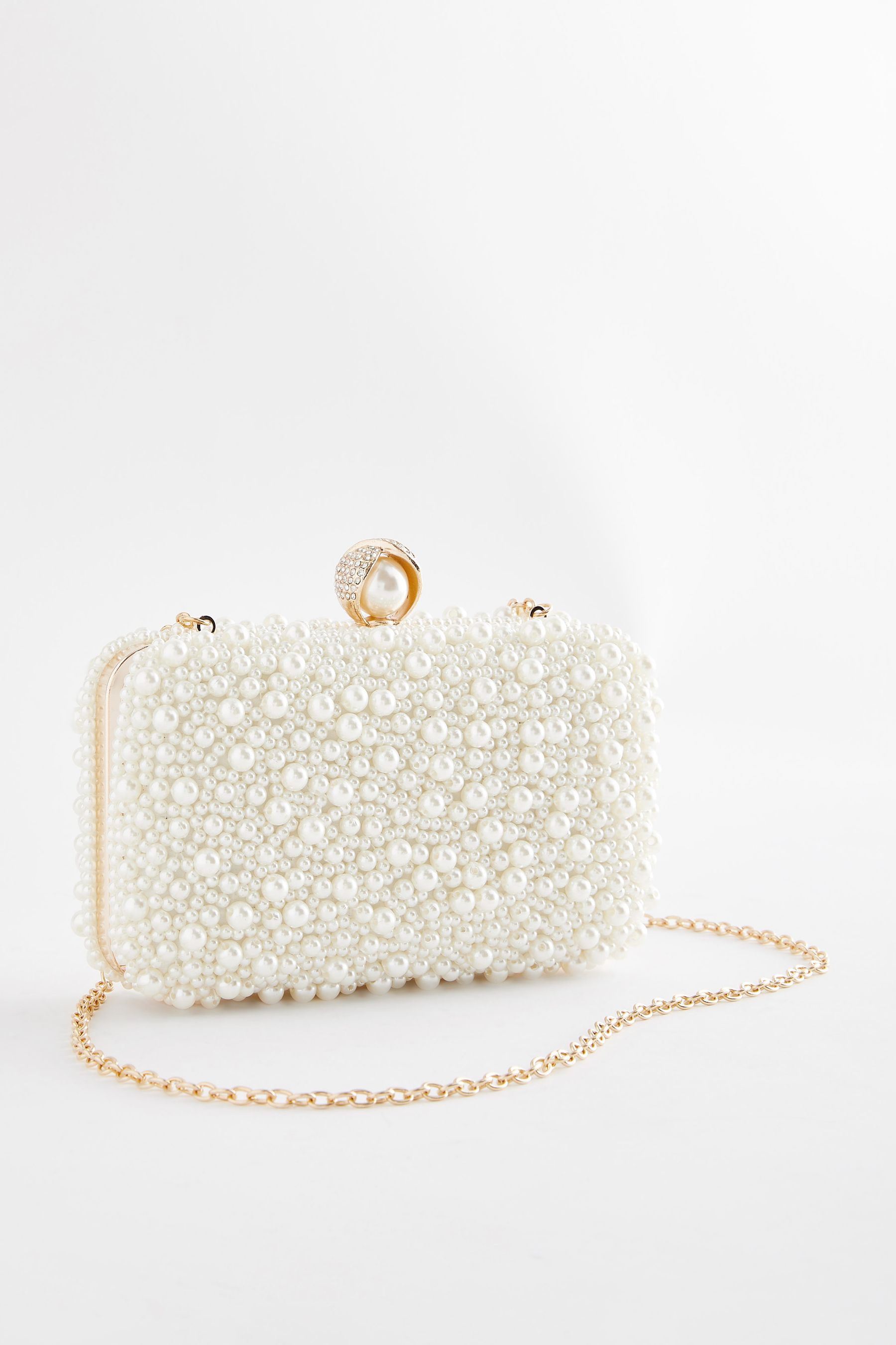 Ivory clutch bag next hotsell
