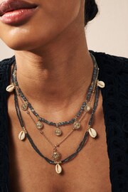 Black Shell Sun Multi Layer Necklace - Image 1 of 4