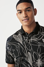 Black/White Floral Print Textured Polo Shirt - Image 1 of 8