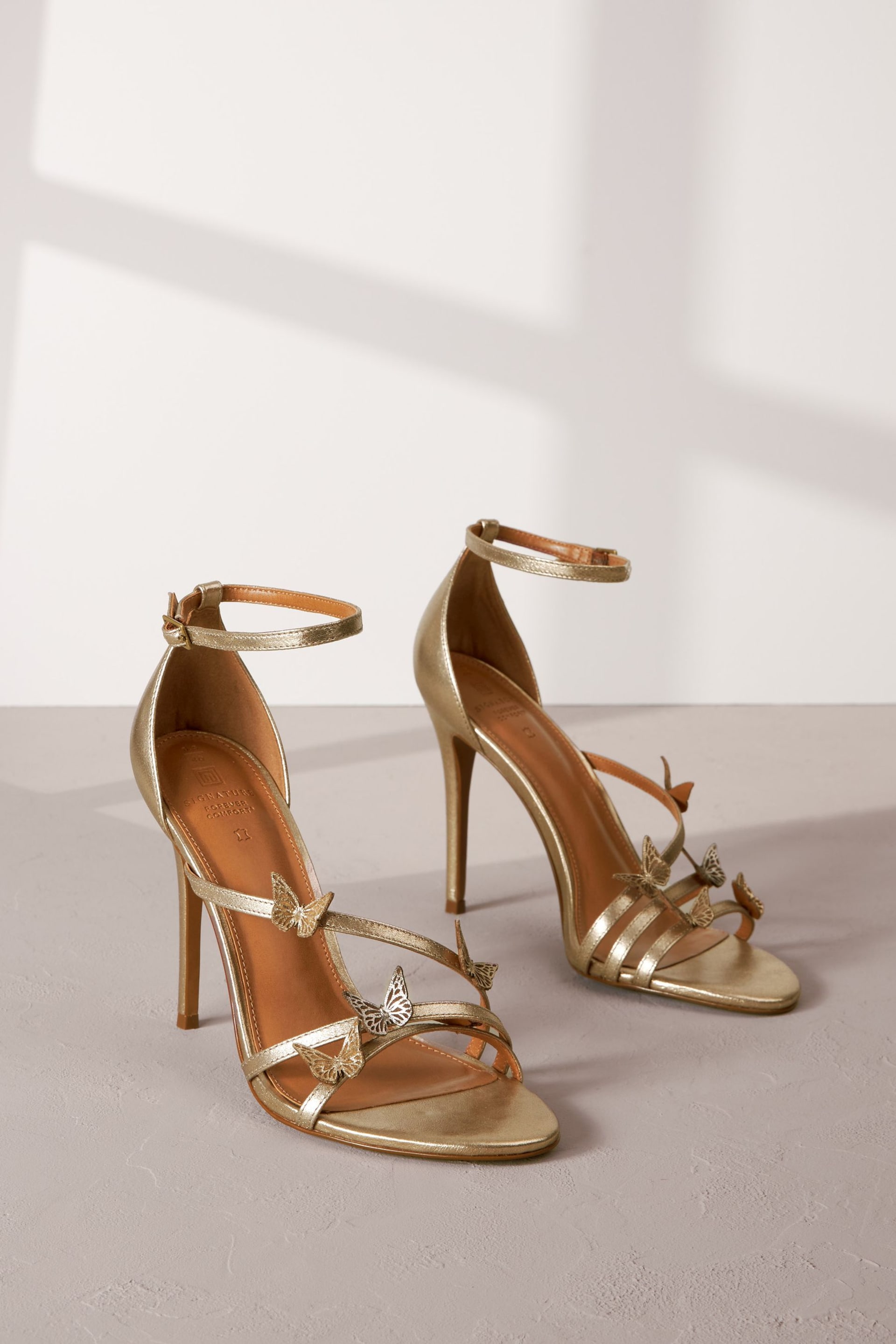Gold Signature Leather Butterfly High Heel Sandals - Image 1 of 6