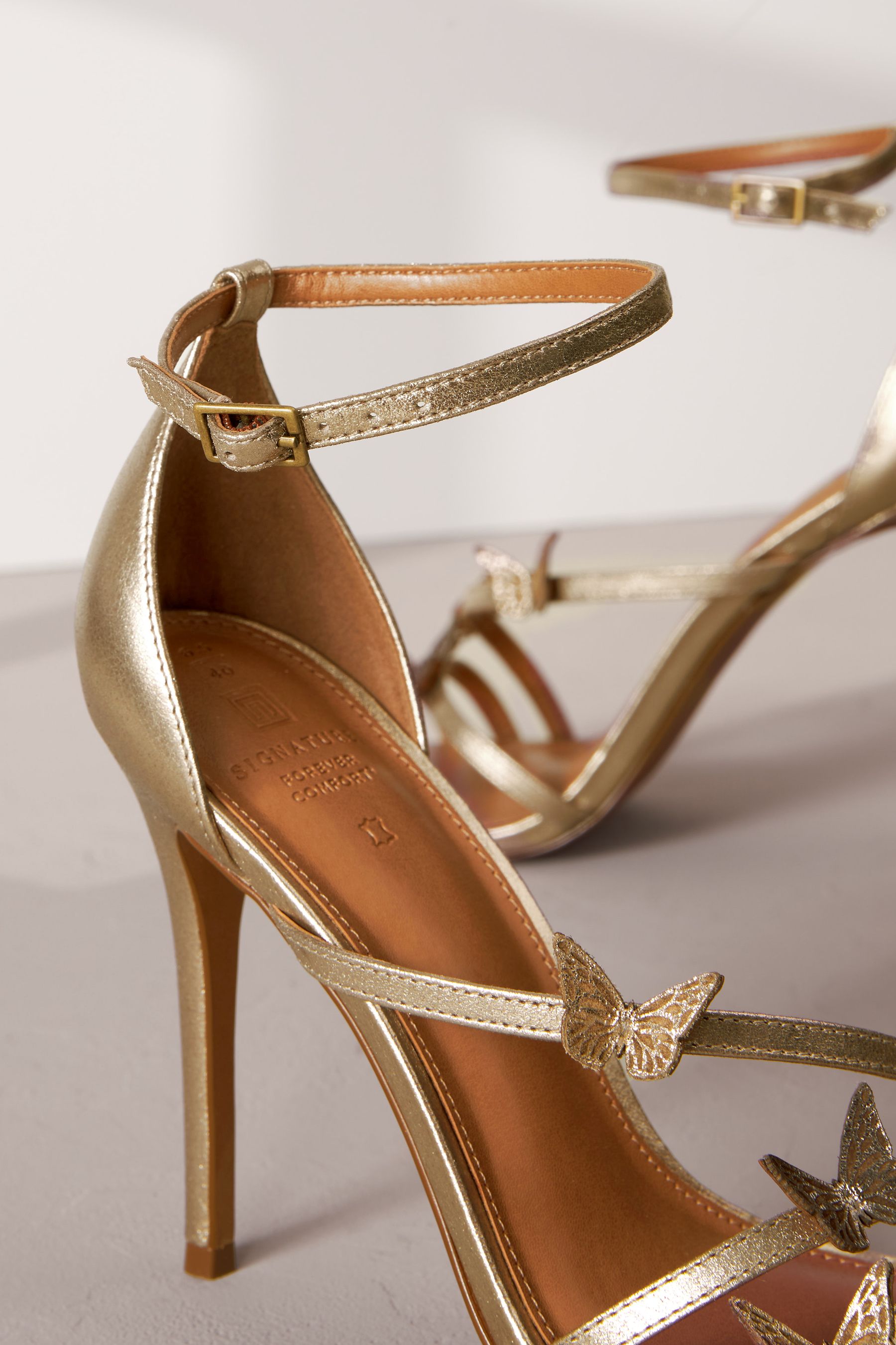 Next gold heels shop