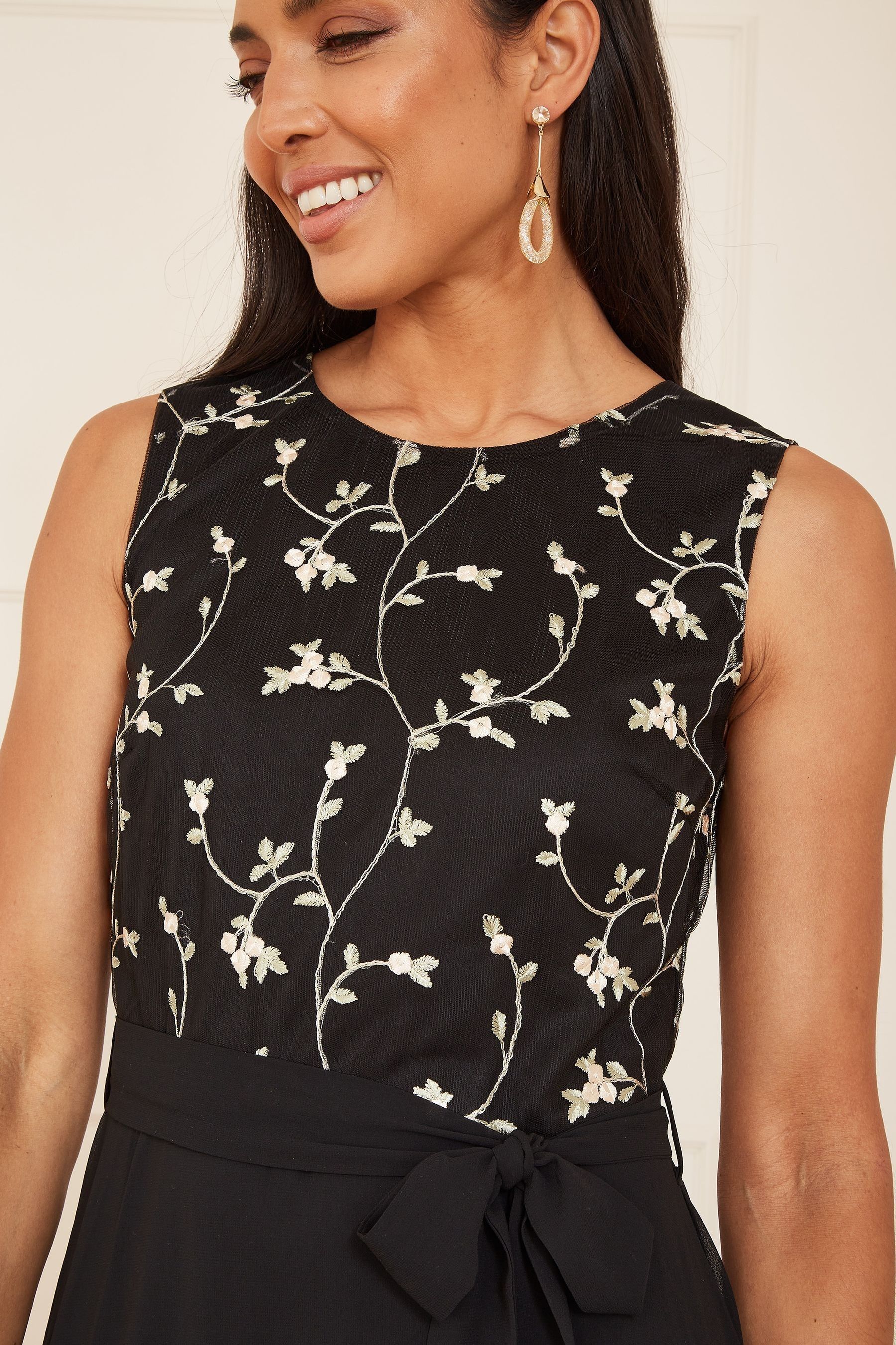 Buy Mela Black Embroidery Midi Skater Dress With Dip Hem from Next Luxembourg