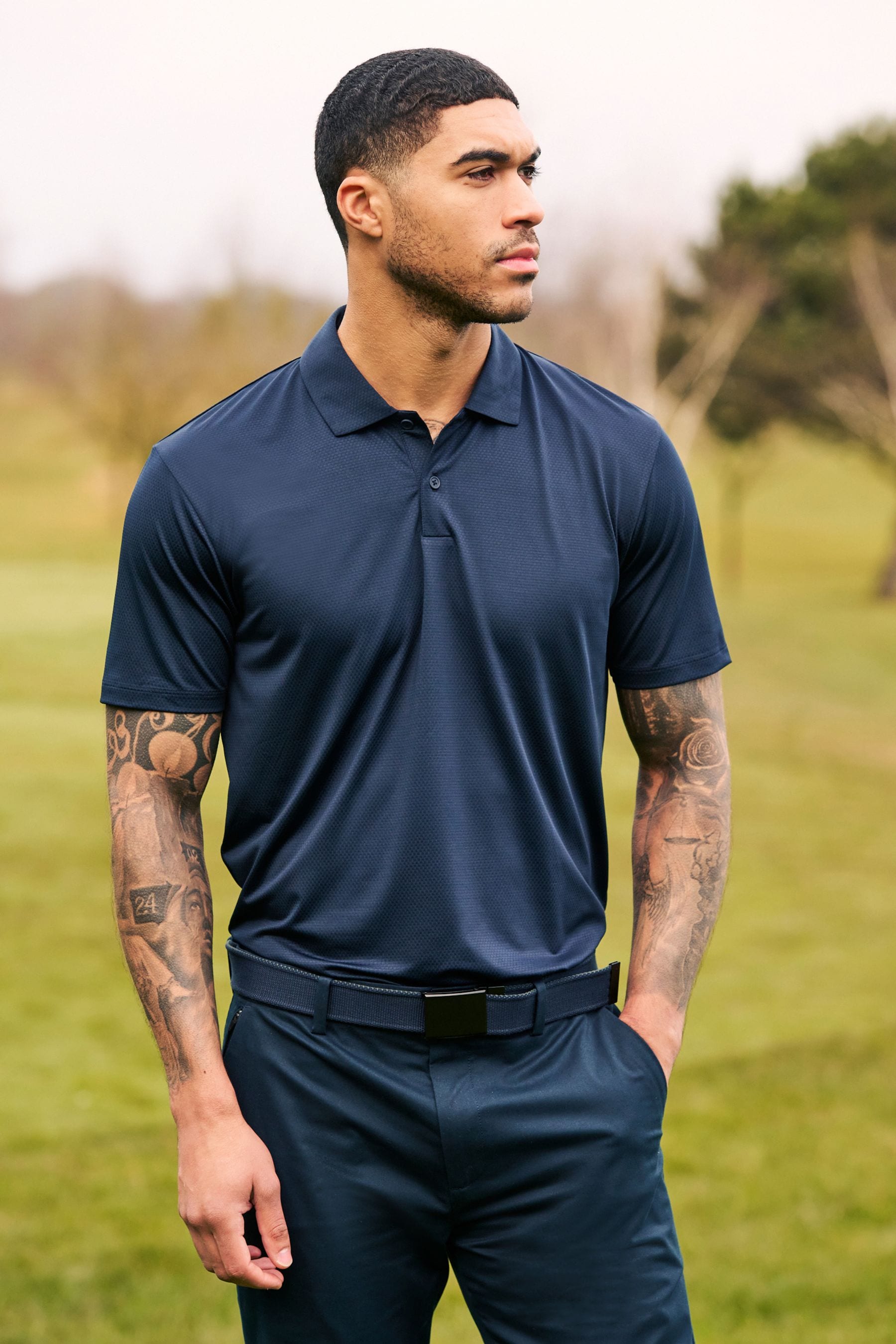 Buy Navy Blue Active Textured Golf Polo Shirt from the Next UK online shop
