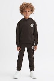 Reiss Chocolate Cade Junior Relaxed Garment Dyed Logo Hoodie - Image 1 of 6