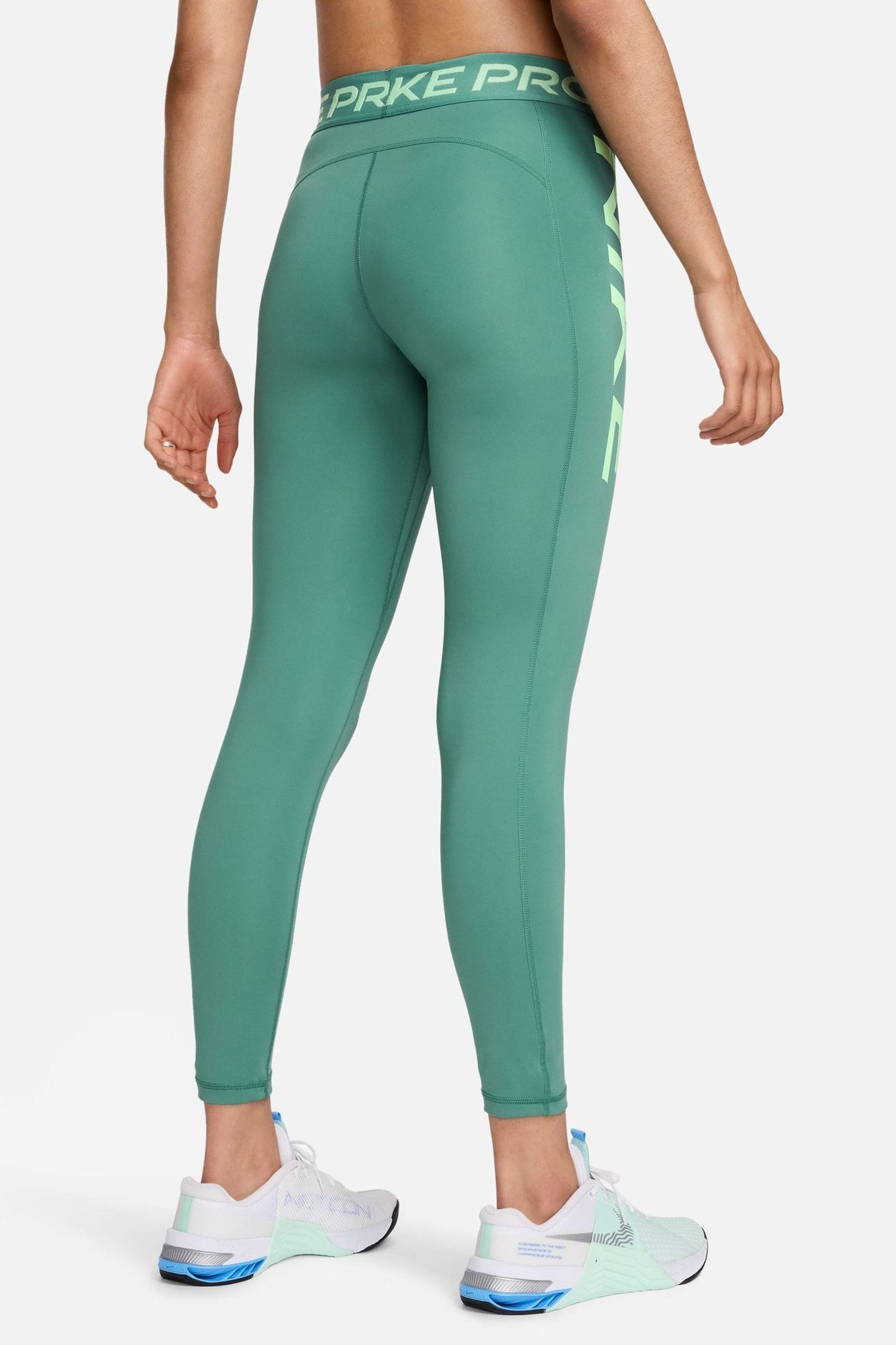 Green Nike Pro Mid Rise 7 8 Graphic Leggings