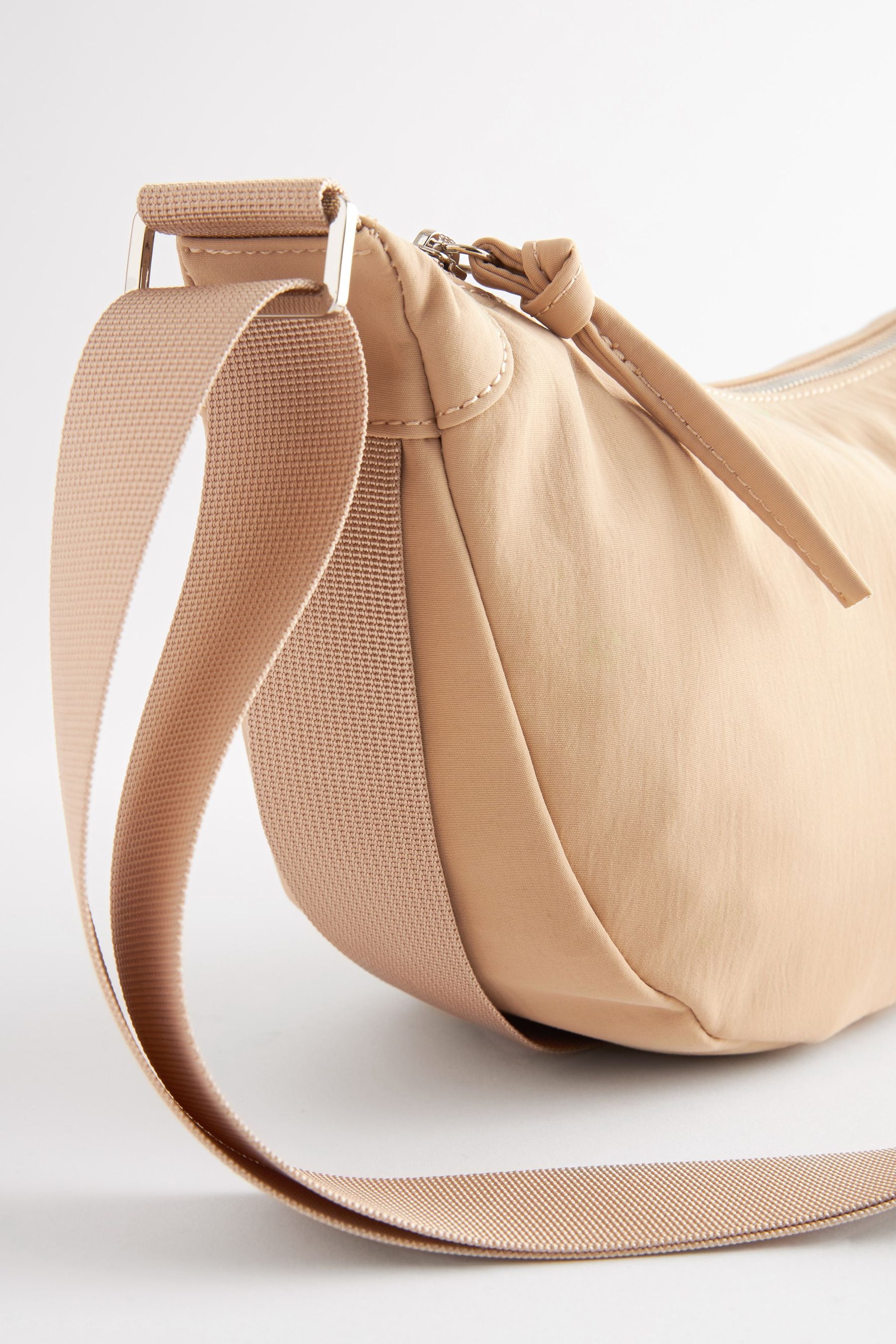 Nike sling bag rose gold on sale