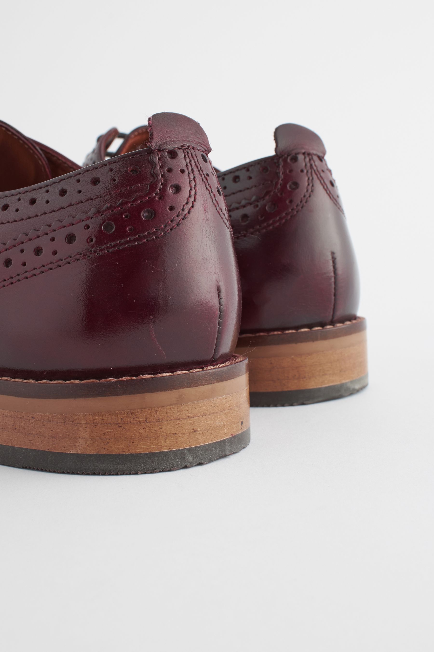 Buy Burgundy Red Standard Fit Leather Contrast Sole Brogue Shoes from Next Luxembourg