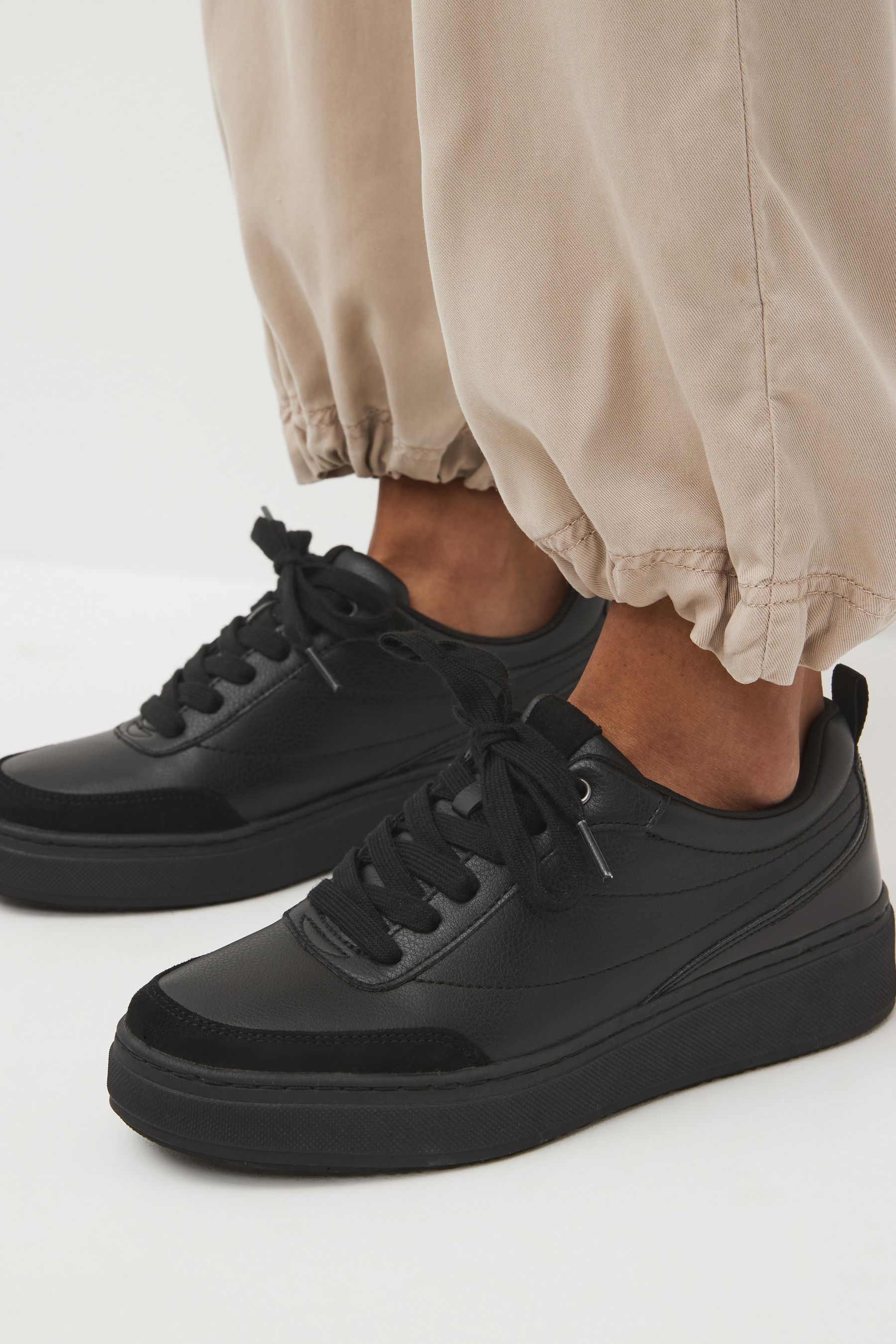 Chunky sole black trainers on sale