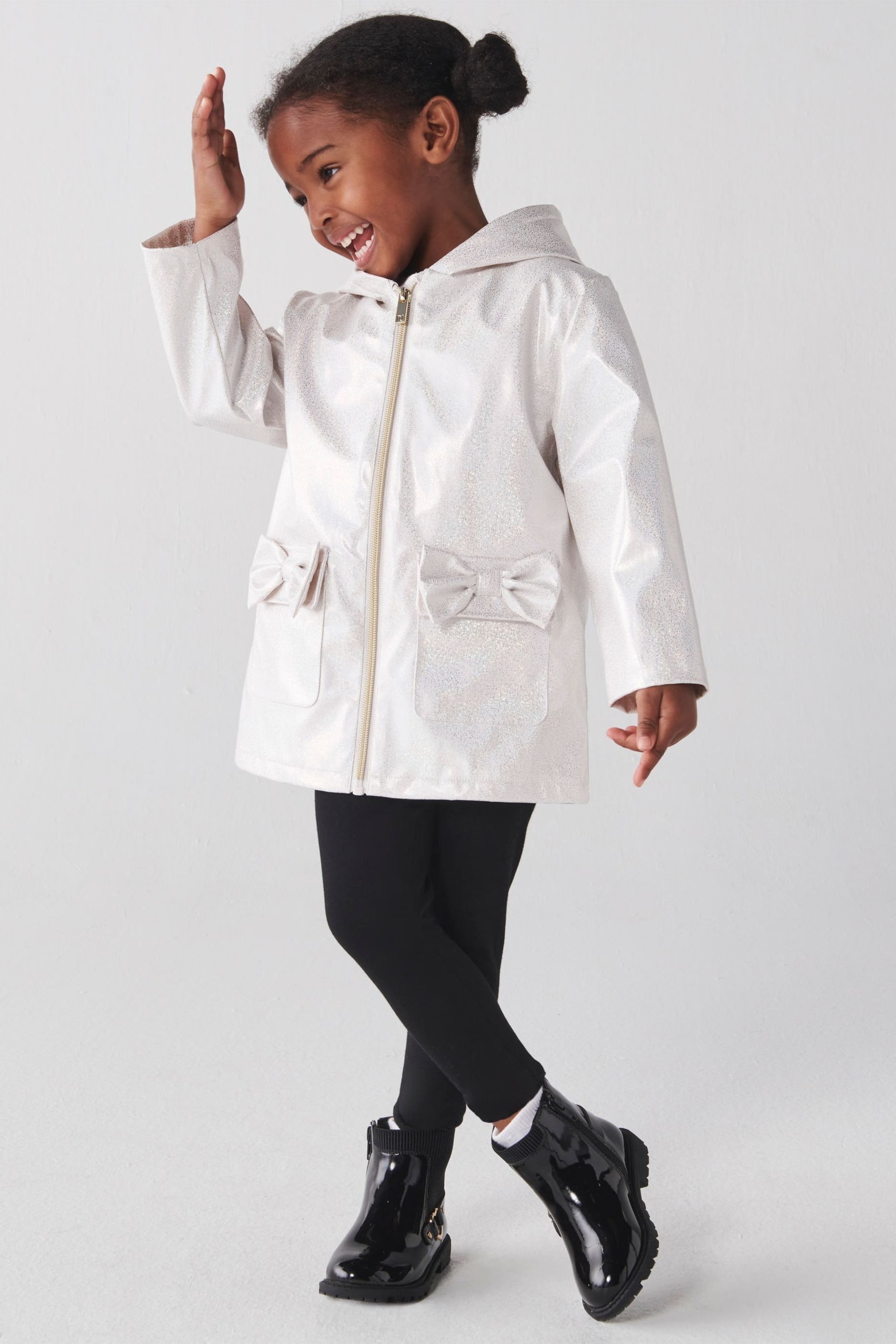 River Island White Mini Girls Glitter Hooded Rain Jacket - Image 1 of 3