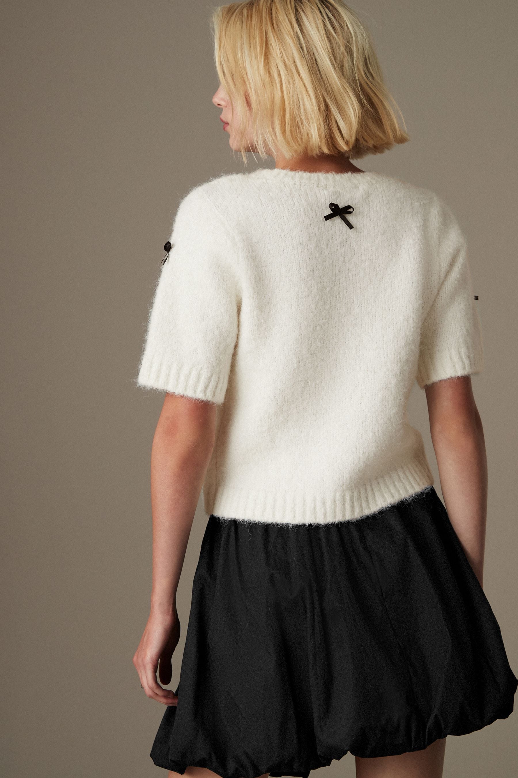 Jumper with bows on sleeves 2025