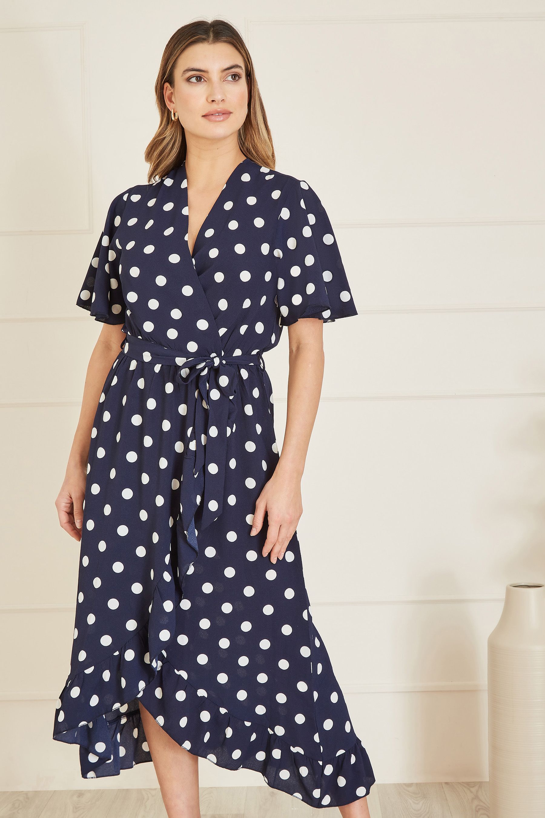 Buy Mela Blue Spot Print Wrap Midi Dress With Frill Detail from Next Luxembourg