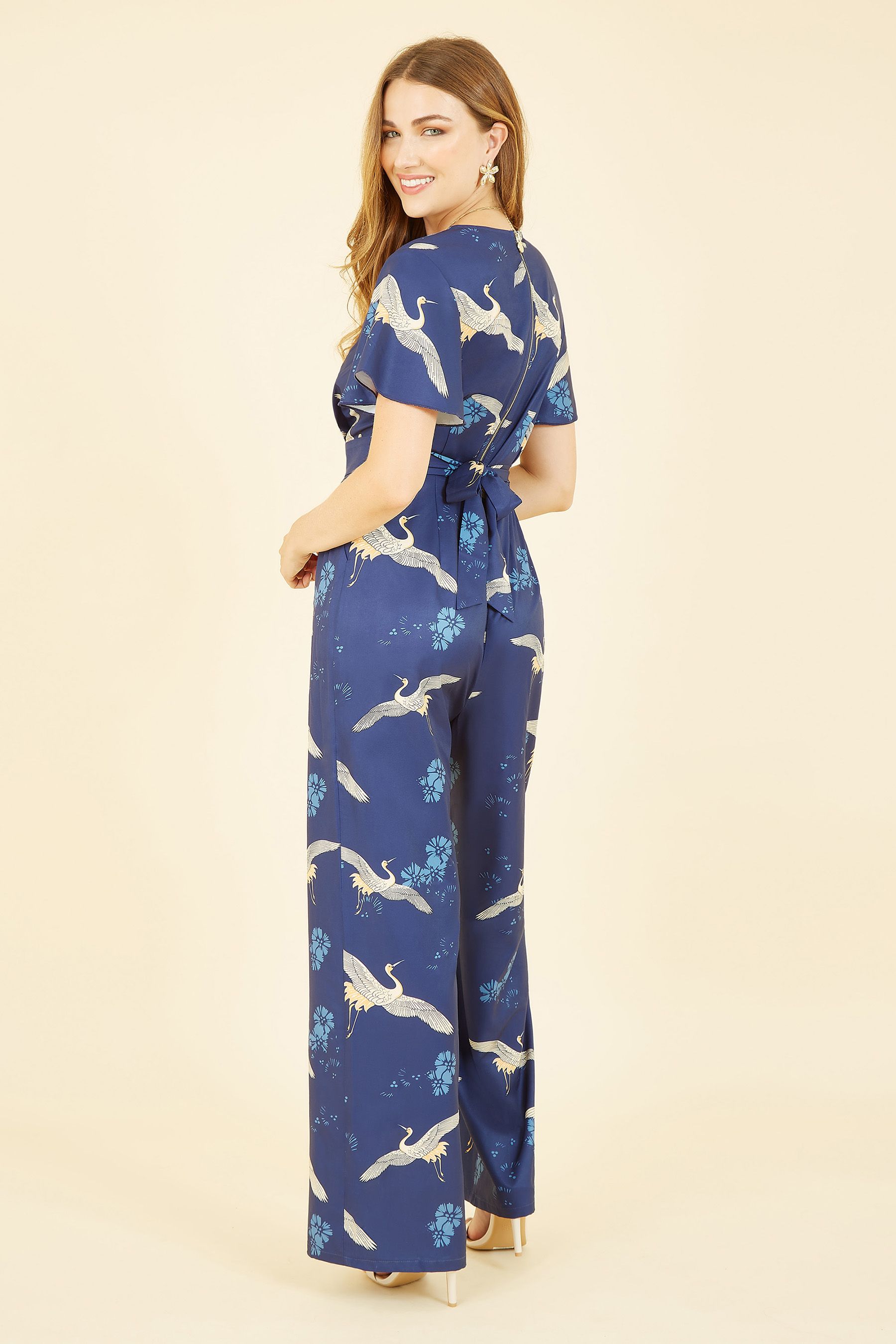 Buy Yumi Blue Crane Print Jumpsuit from the Next UK online shop