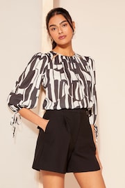 Friends Like These Black/White 3/4 Sleeve Chiffon Tie Cuff Blouse - Image 2 of 4