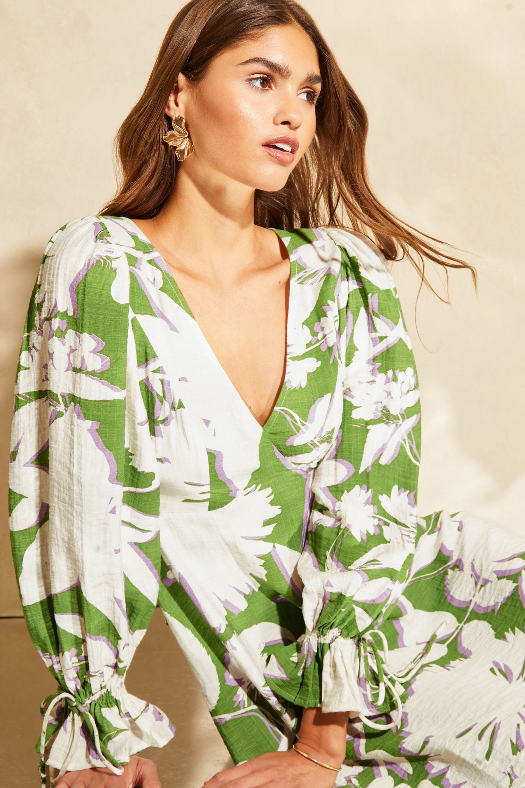 Buy Lipsy Green White Long Sleeve Tie Back Mini Dress from Next Luxembourg