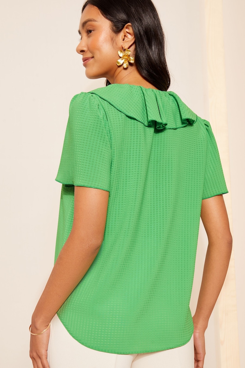 Friends Like These Seersucker Lime Ruffle Front Puff Sleeve Blouse - Image 4 of 4