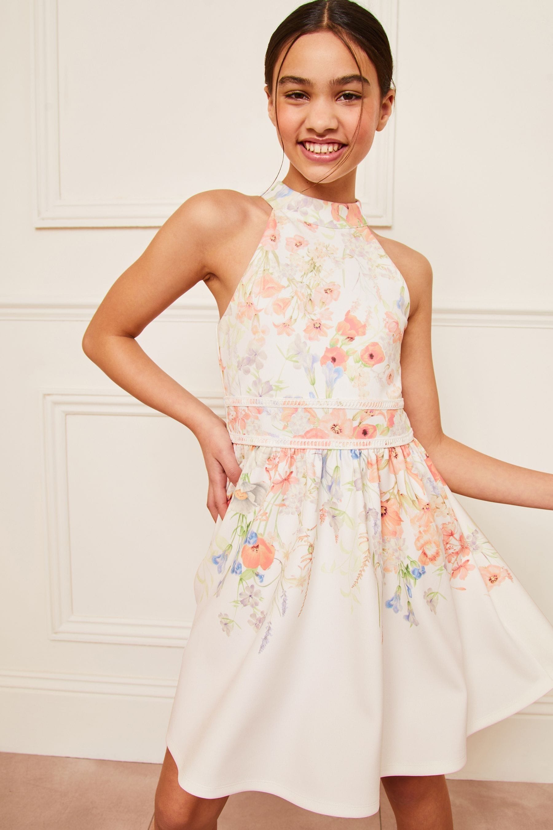 Buy Lipsy Cream Floral Halter Scuba Occasion Dress 5 16yrs from Next Luxembourg