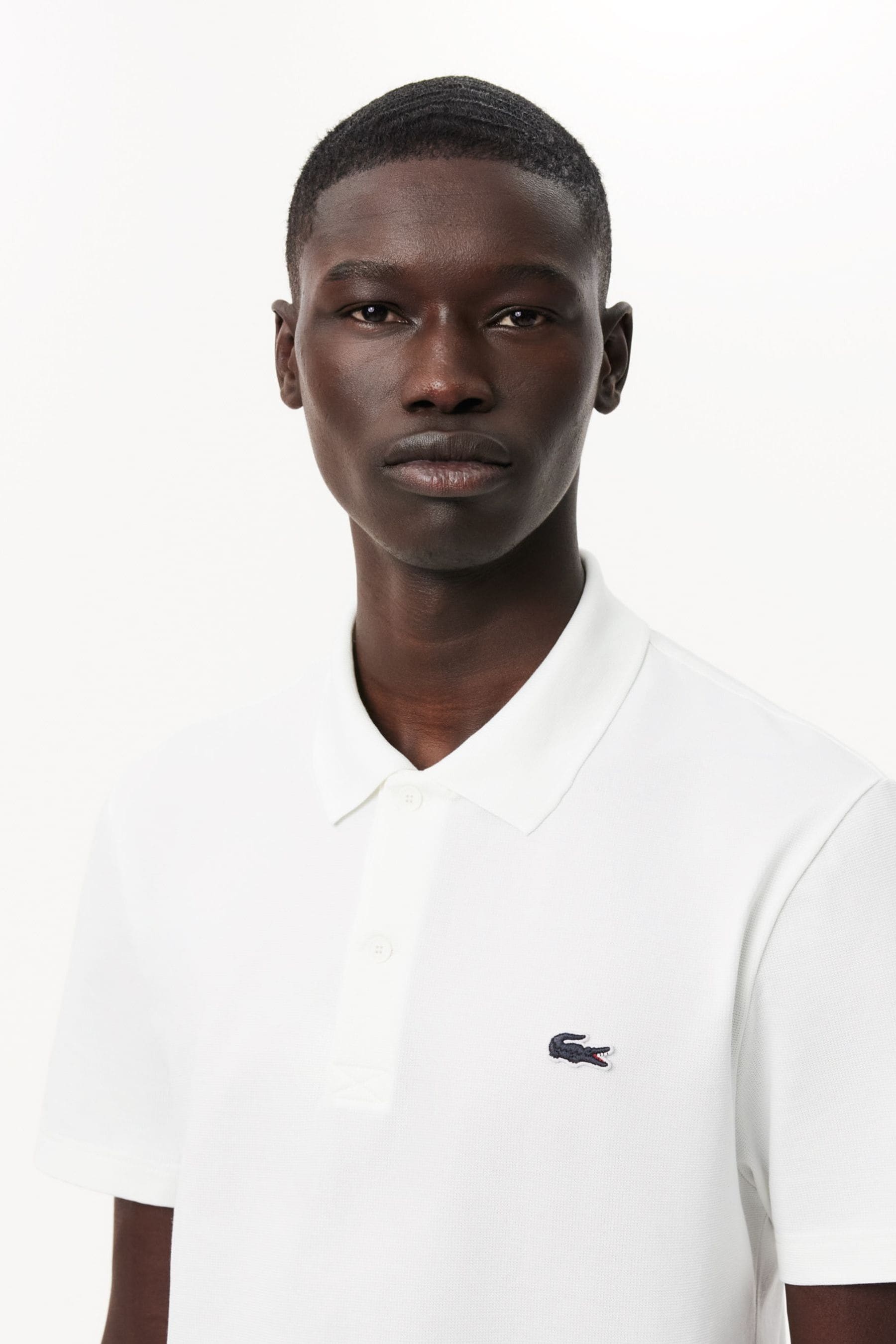 Buy Lacoste Regular Fit Blend Polo Shirt from the Next UK online shop