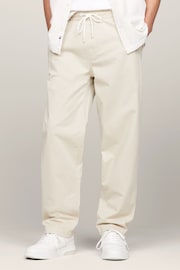 Tommy Jeans Cream Aiden Tapered Trousers - Image 1 of 6