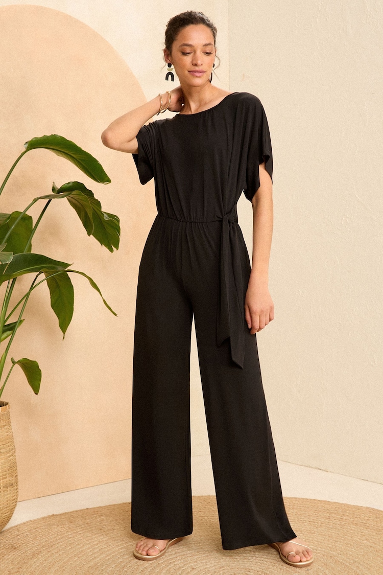 Love & Roses Black Wrap Jersey Jumpsuit - Image 1 of 4