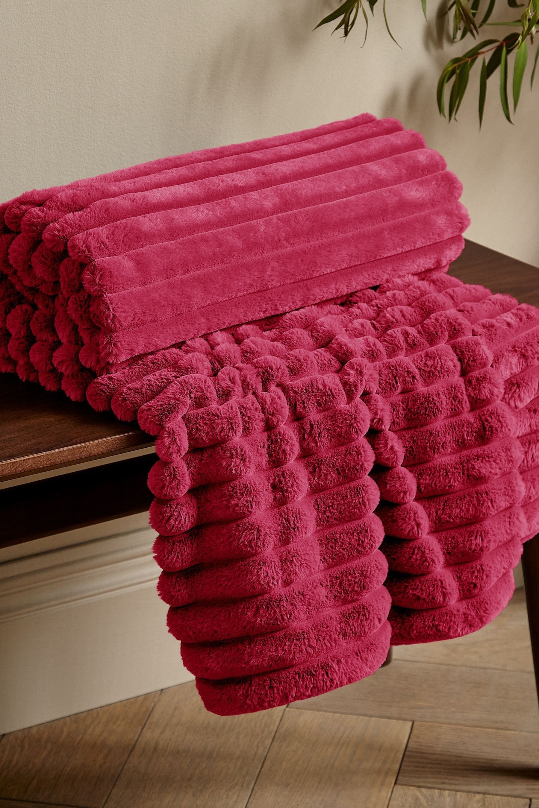 Buy Catherine Lansfield Hot Pink Soft and Cosy Ribbed Faux Fur Throw from Next Luxembourg