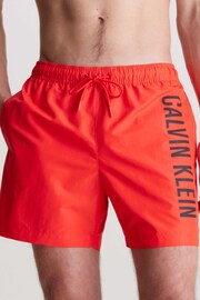 Calvin Klein Red Slogan Swim Shorts - Image 1 of 4