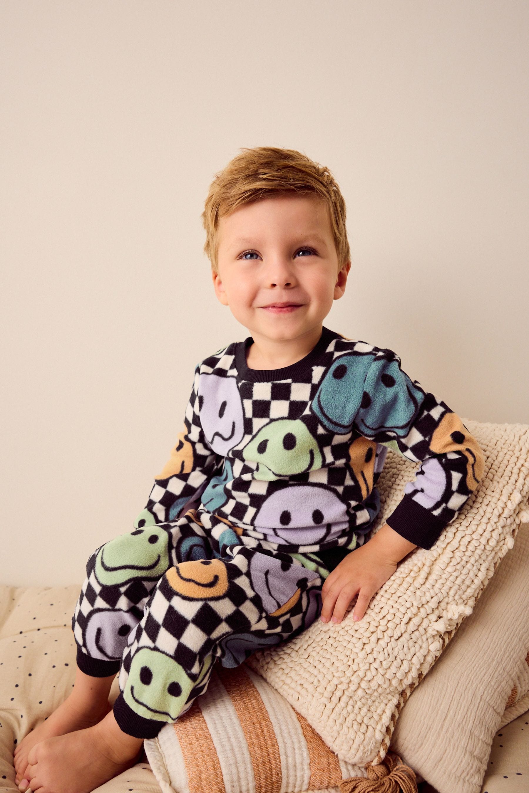 Buy Neutral Black Checkerboard Smile Face Single Soft Touch Fleece With Elastane Pyjamas 9mths 12yrs from Next Saudi Arabia
