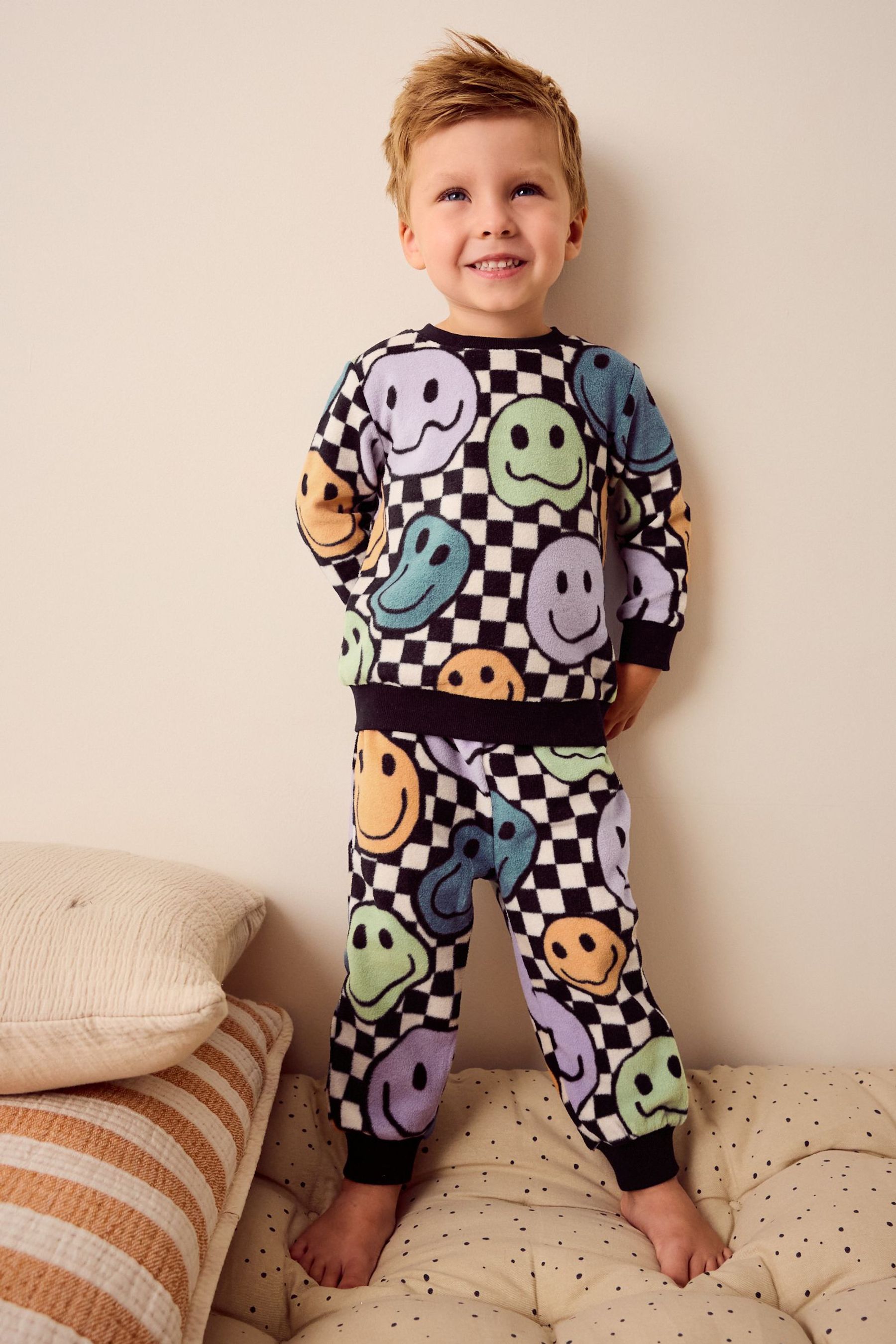 Buy Neutral Black Checkerboard Smile Face Single Soft Touch Fleece With Elastane Pyjamas 9mths 12yrs from Next Saudi Arabia