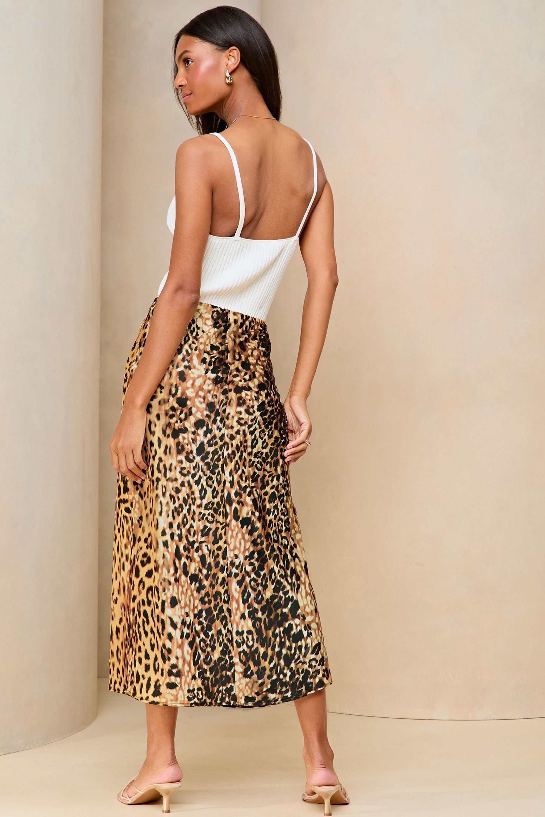Buy Lipsy Leopard Print Petite Satin Bias Cut Midi Skirt from the Next UK online shop