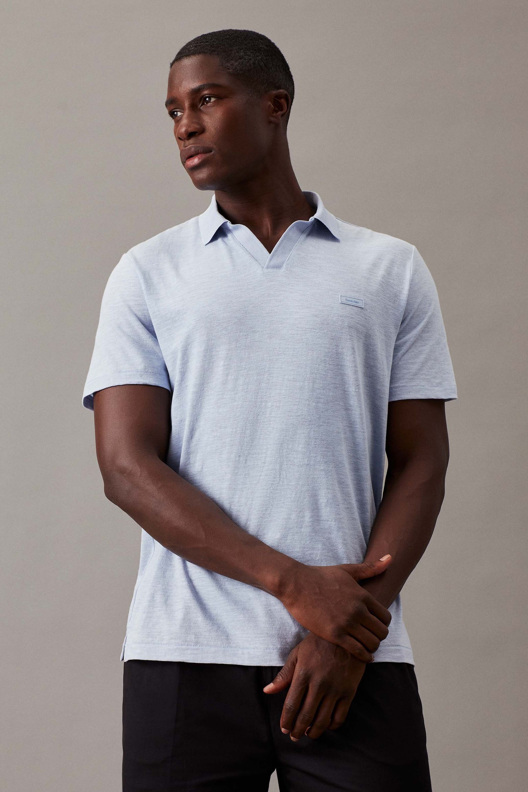 Buy Calvin Klein Blue V Neck Open Collar Polo Shirt from Next Luxembourg