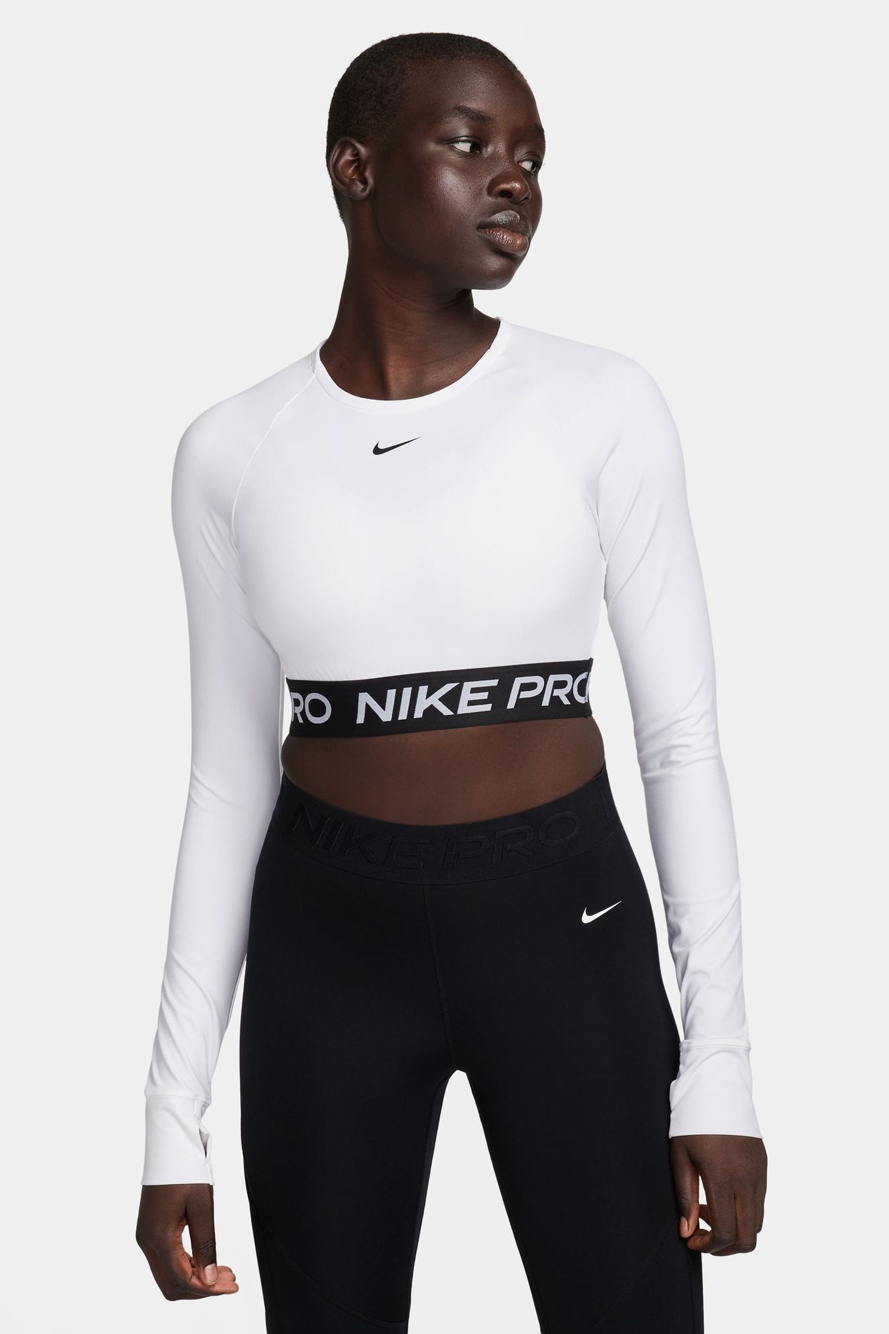 Buy Nike White Pro Dri FIT Cropped Long Sleeve Top from Next Luxembourg