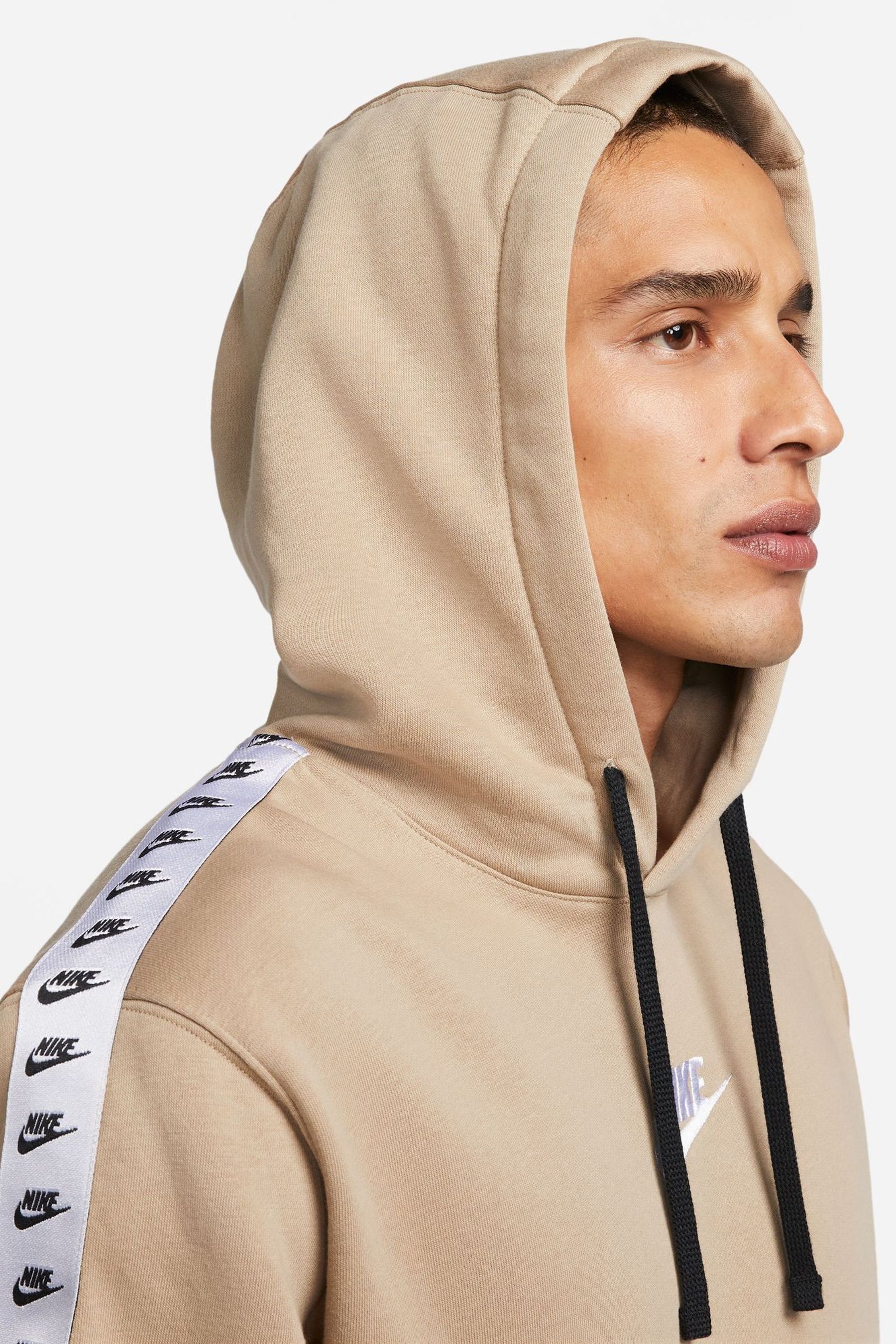 Nike beige tracksuit sales