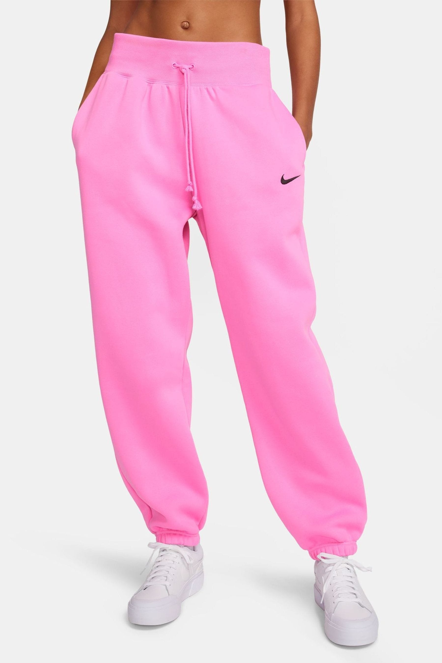 Buy Nike Bright Pink Oversized Mini Swoosh Joggers from Next Belgium