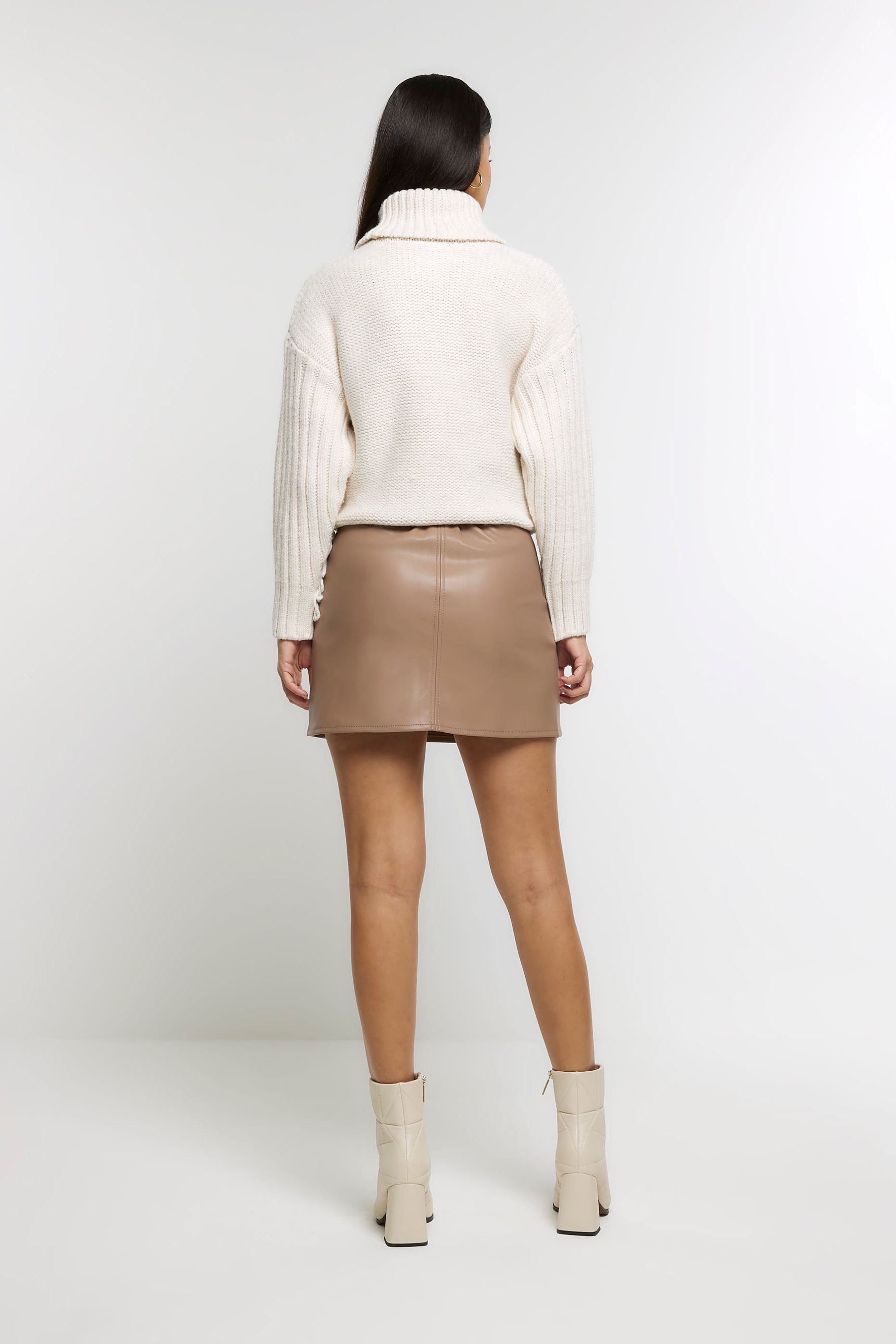 Leather mini skirt river island top