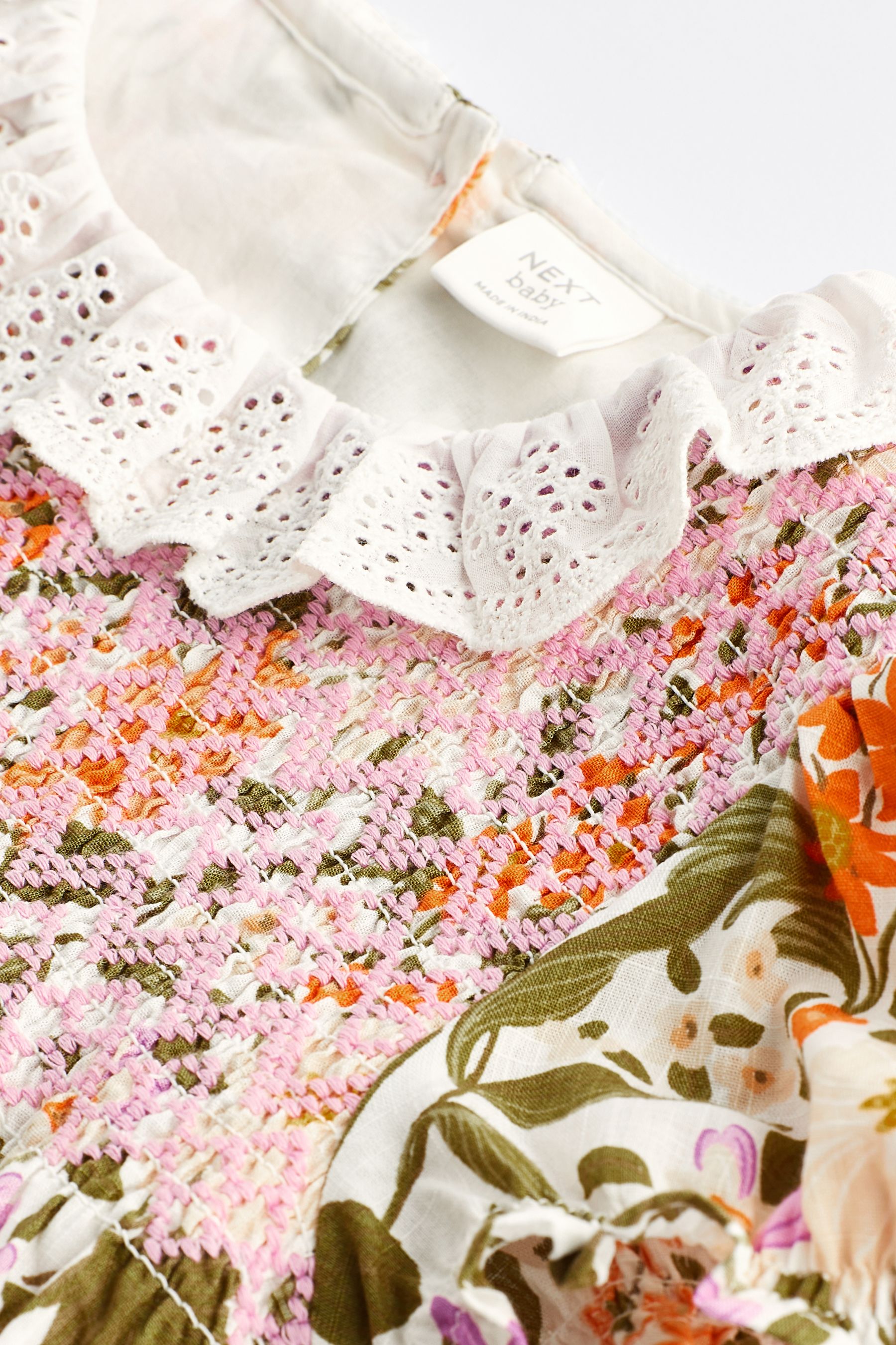 Buy Orange violet a fleurs Barboteuse Bloomer a col pour bebe 0 mois a 2 ans from Next Luxembourg
