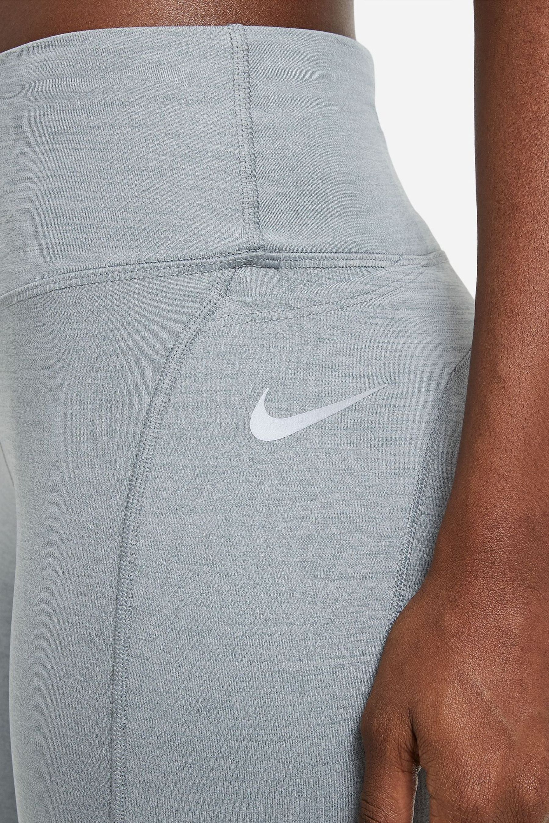 Nike patterned running leggings shop
