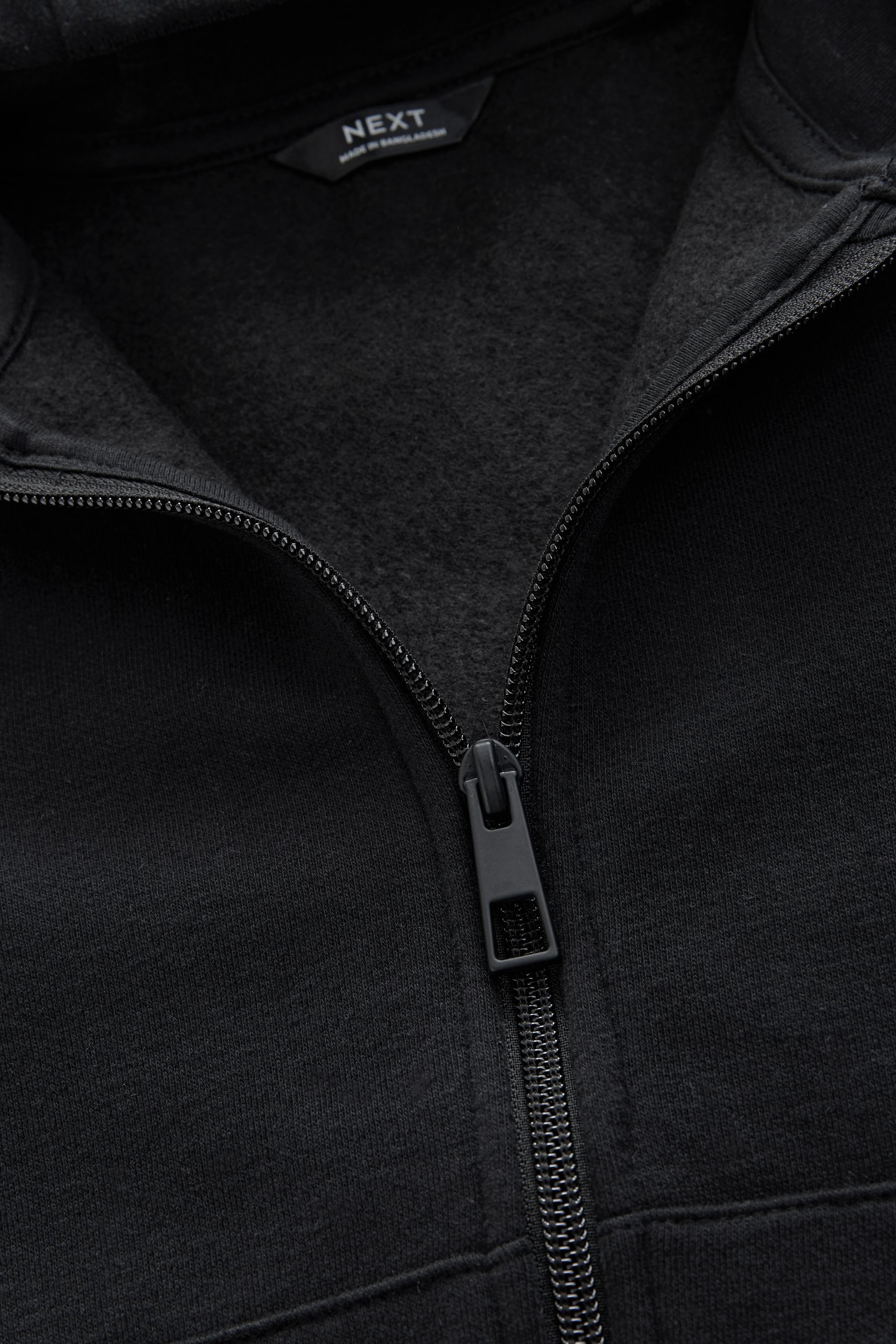 Buy Black Plain Zip Through Hoodie 3 16yrs from the Next UK online shop