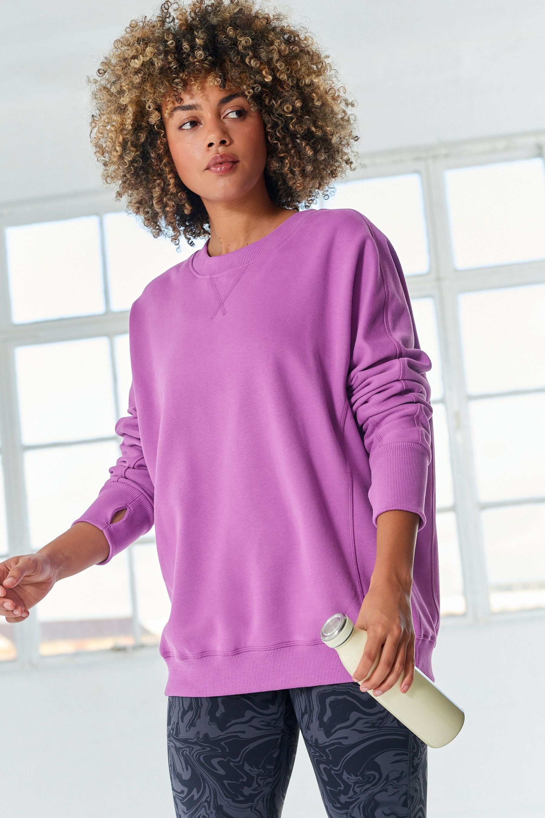 Longline crew neck sweatshirt on sale