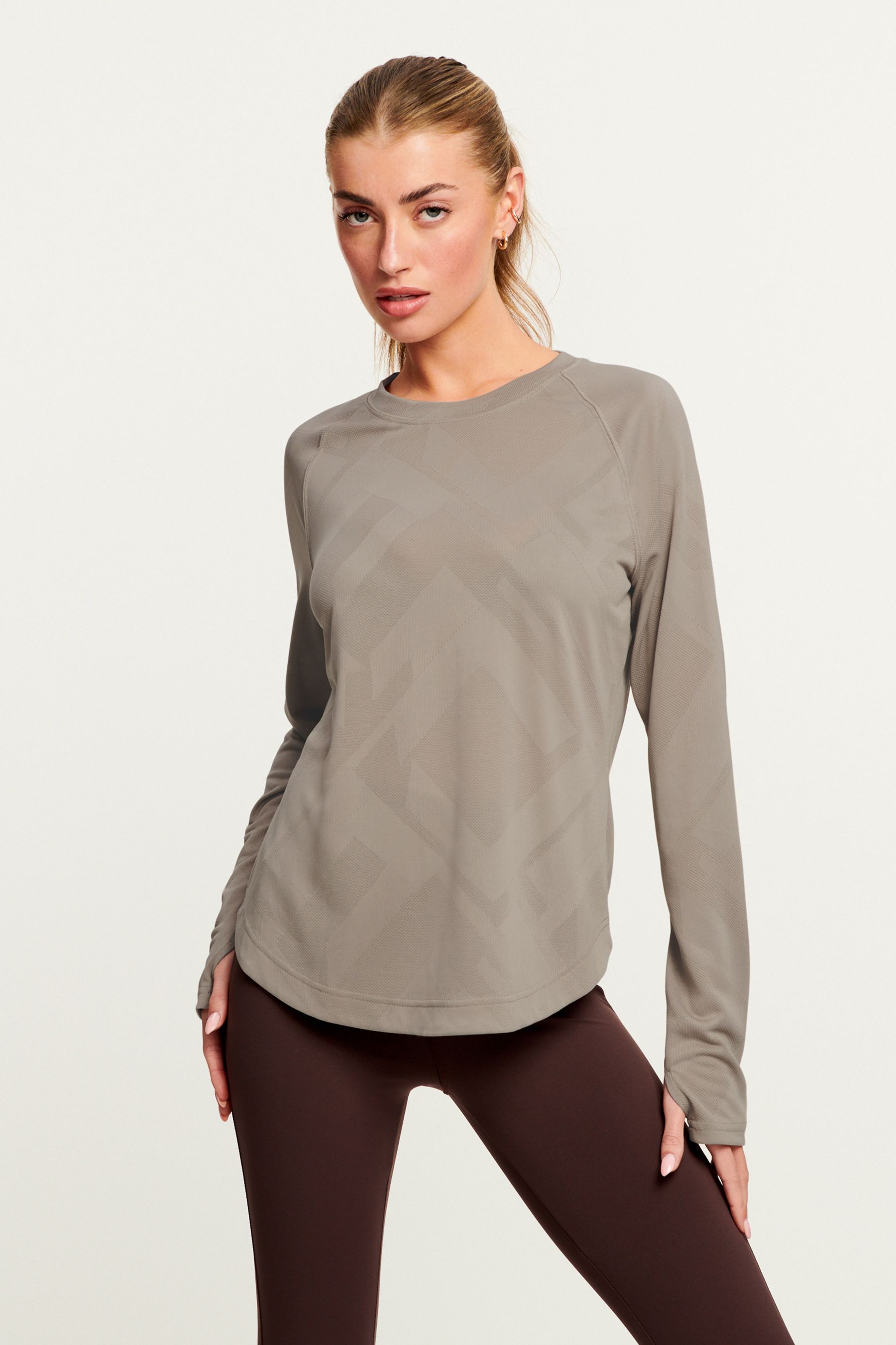 Buy Neutral Next Active Long Sleeve Jacquard Geo Sport Top from Next Oman