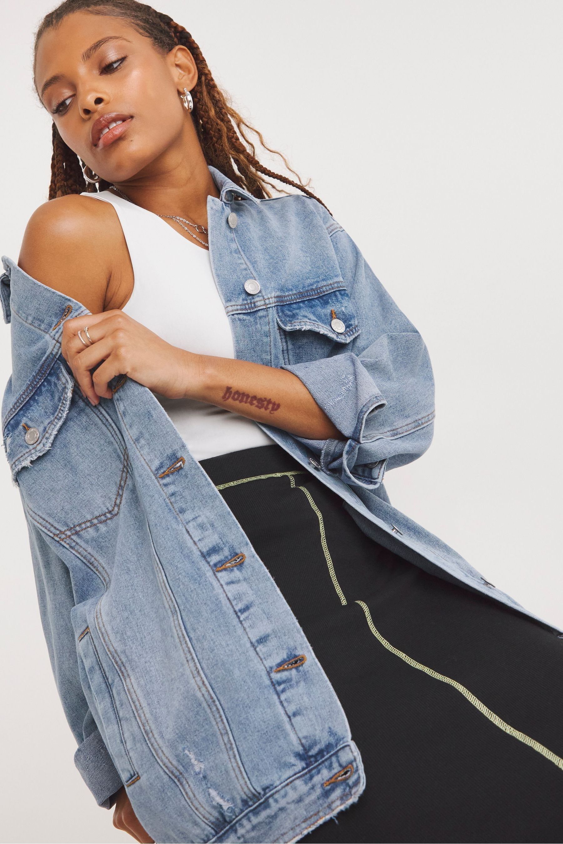 Light wash distressed denim jacket top