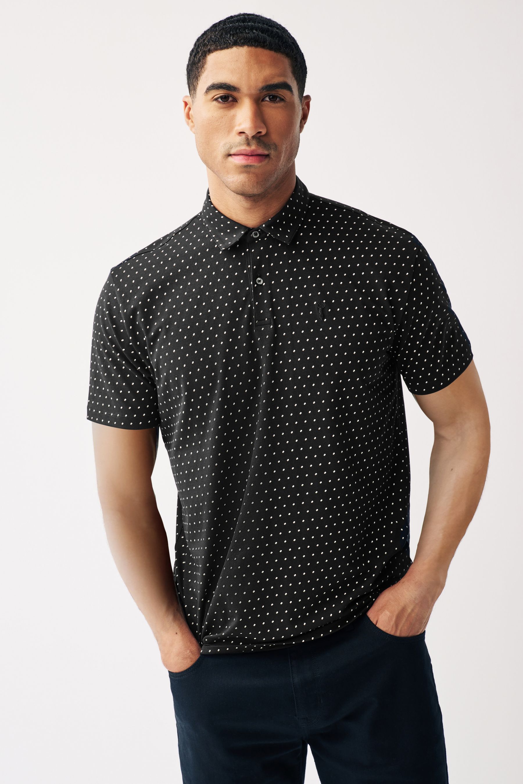 Buy Black Short Sleeve Polka Dot Polo Shirt from the Next UK online shop