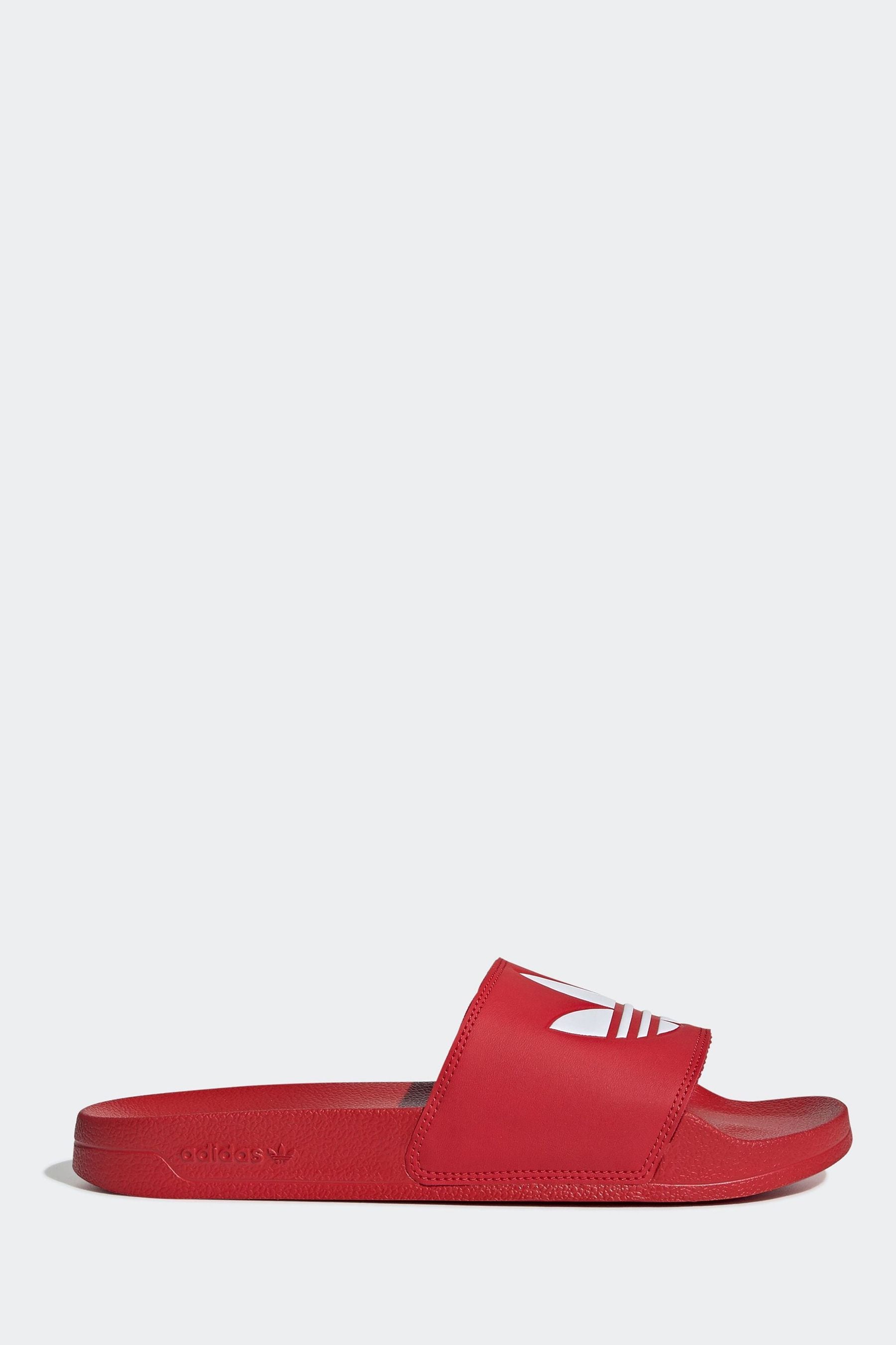 Red adilette slides store