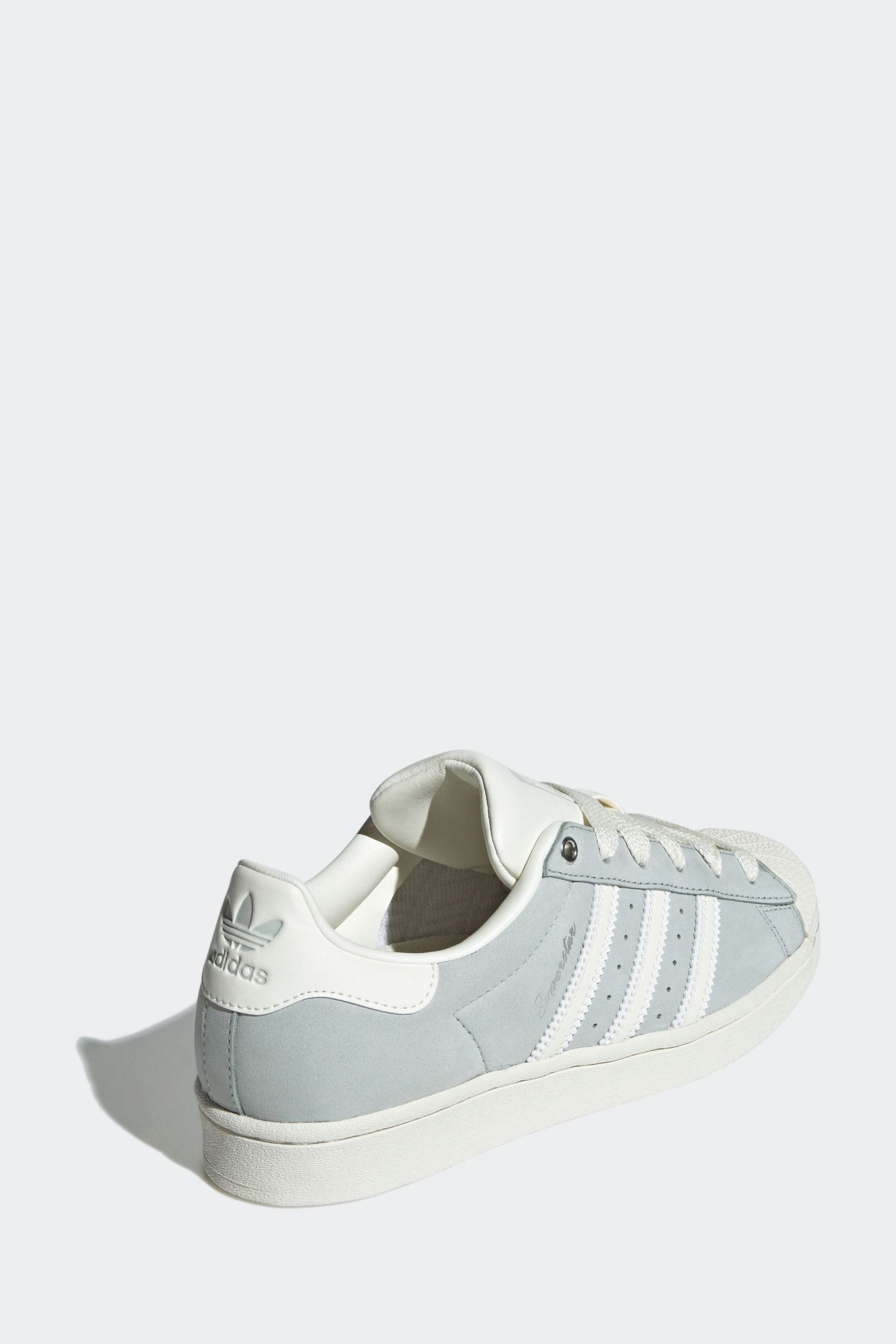 Women's white superstar sneakers online